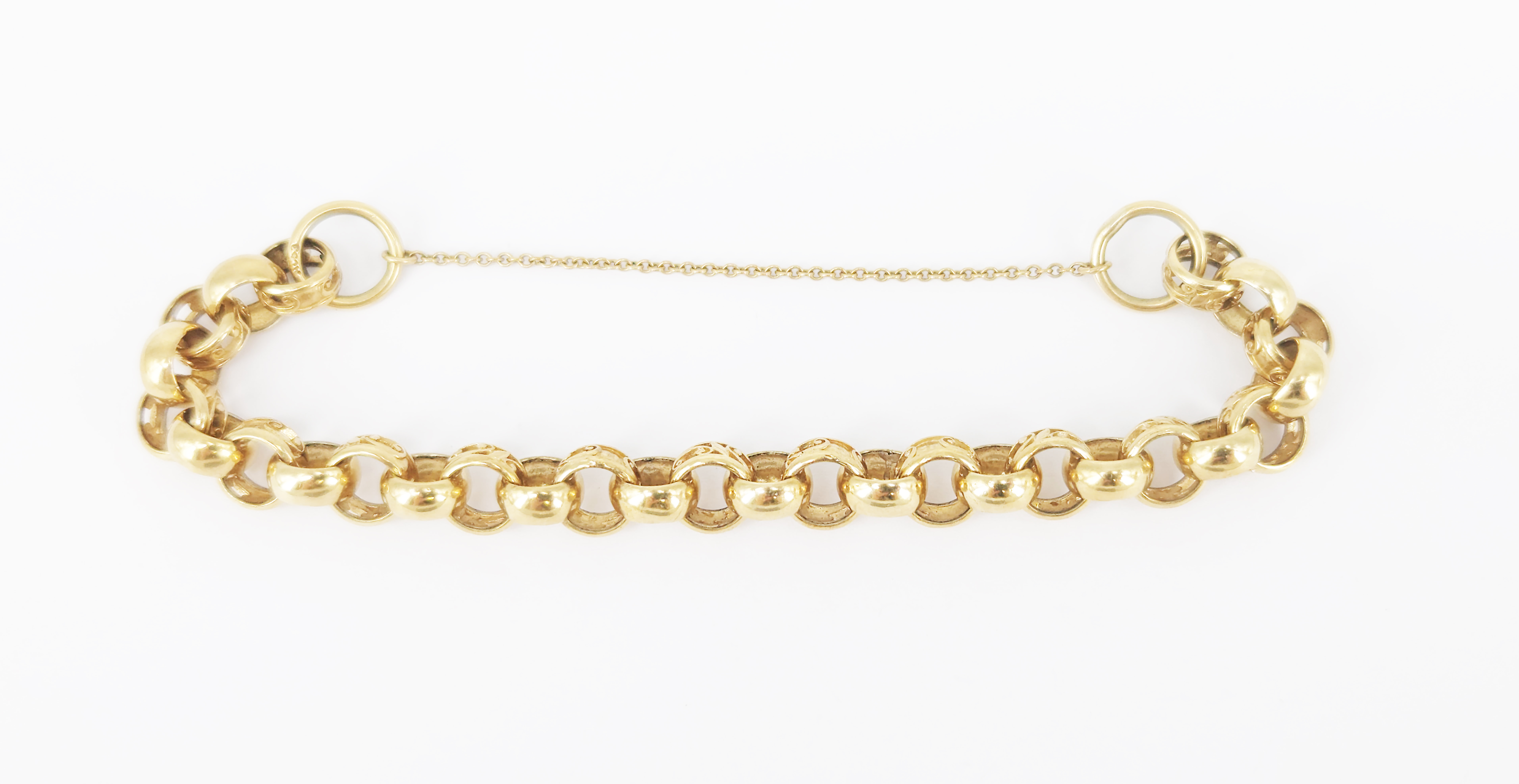 81 · A 9ct YELLOW GOLD SOLID AND FILIGREE LINK BRACELET