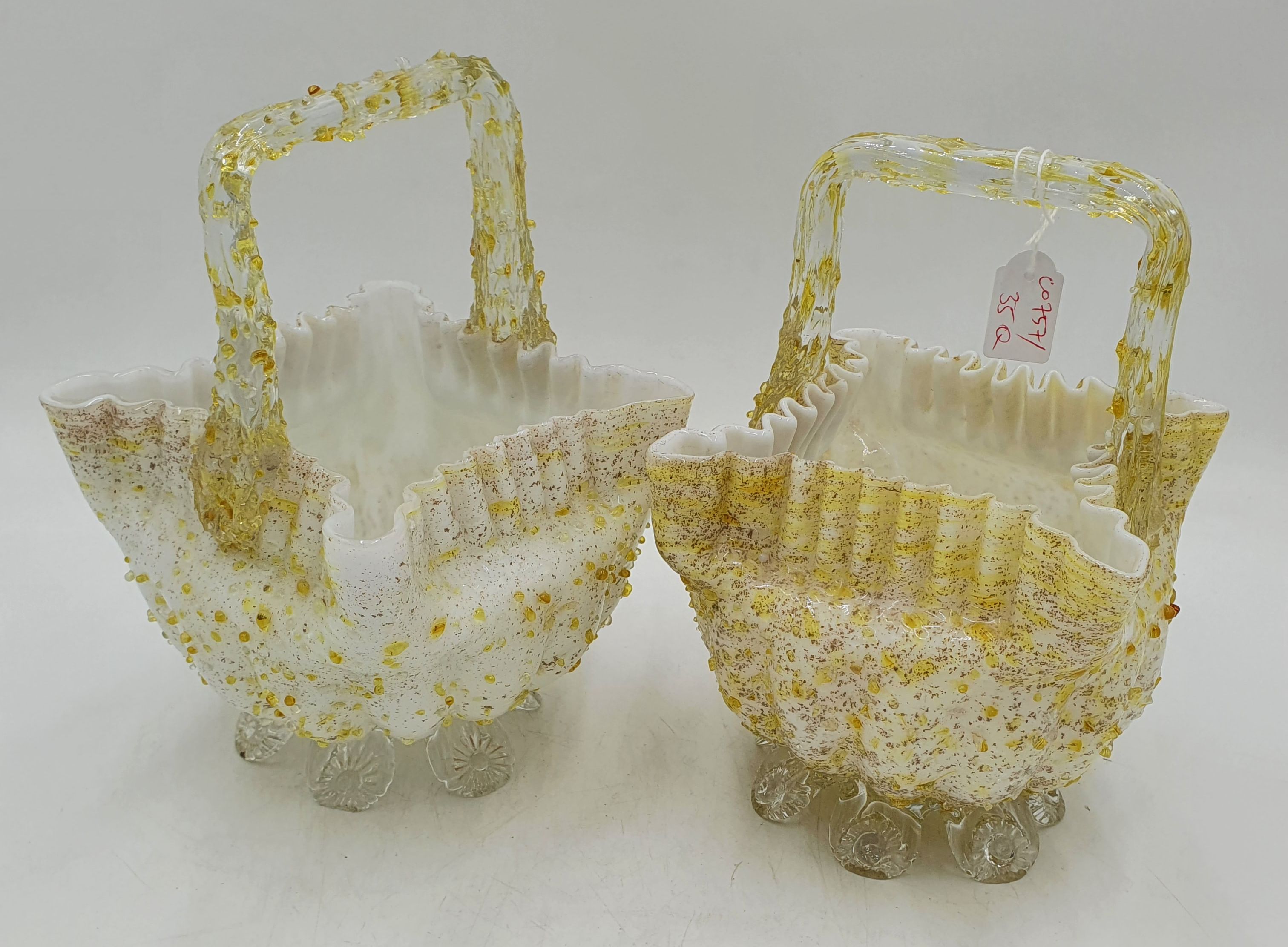 627 · A NEAR PAIR OF EARLY 20TH CENTURY BOHEMIAN PEBBLED BASKETS