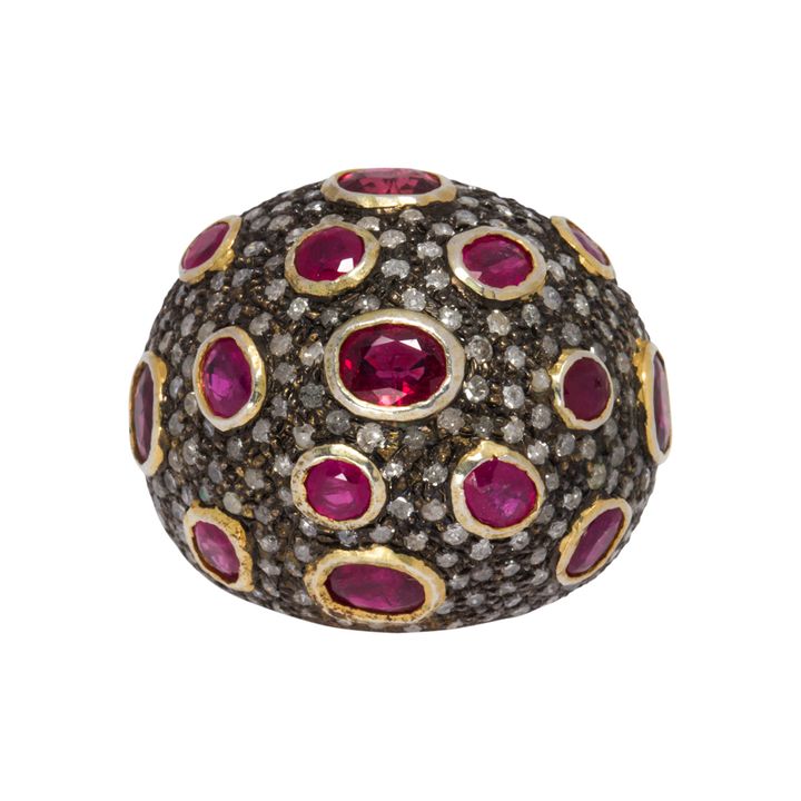 A ruby, diamond, blackened silver and 14k gold ring