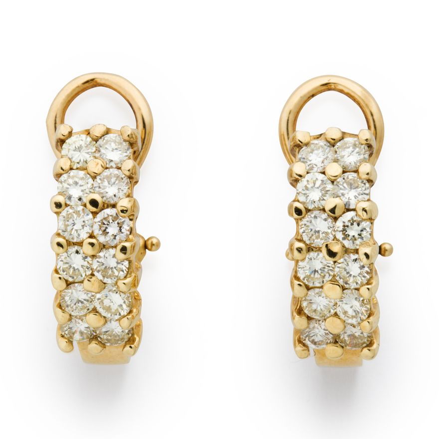A pair of yellow diamond and fourteen karat gold earrings