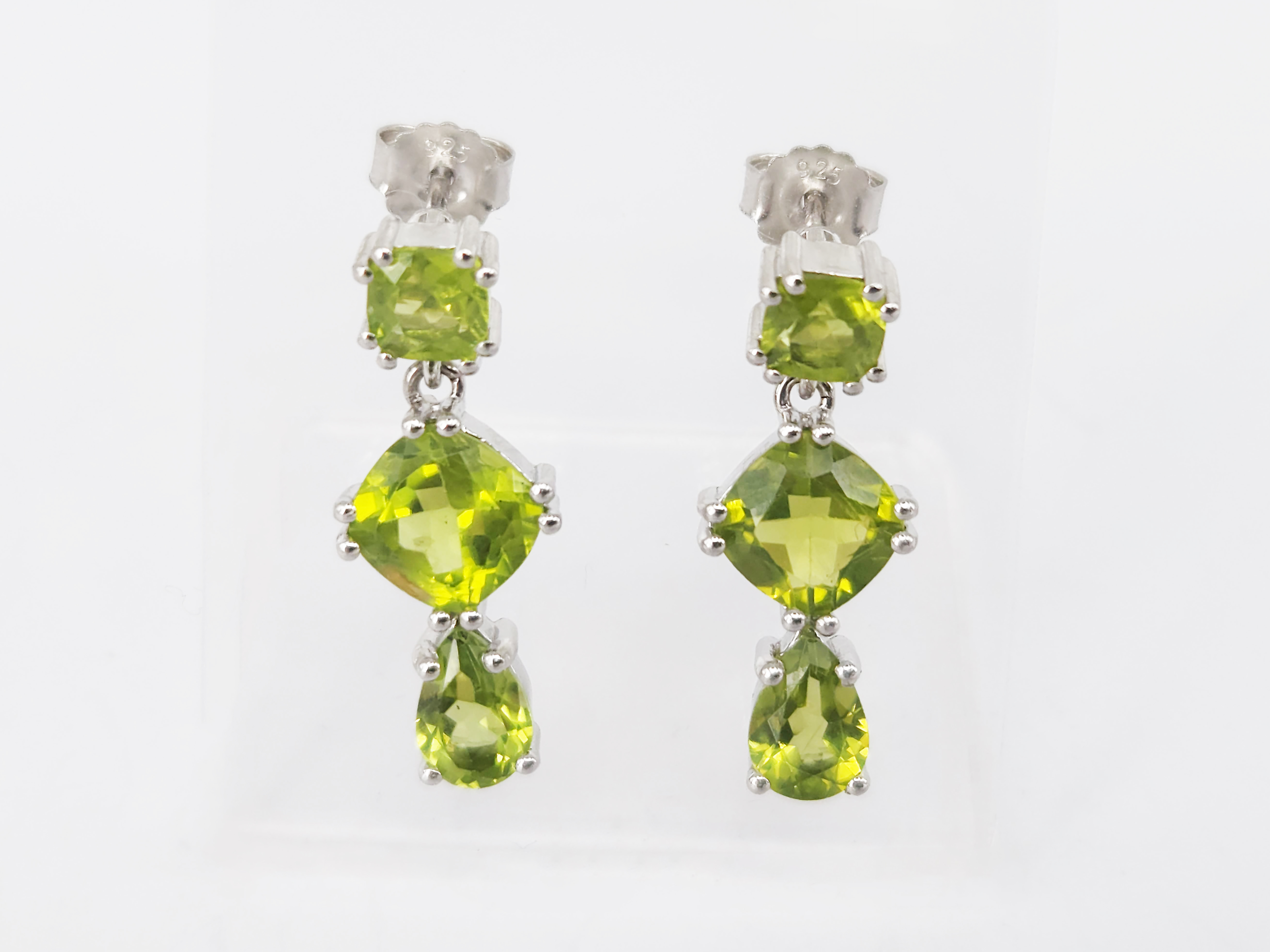 A Pair Of Silver And Peridot Drop Earrings
