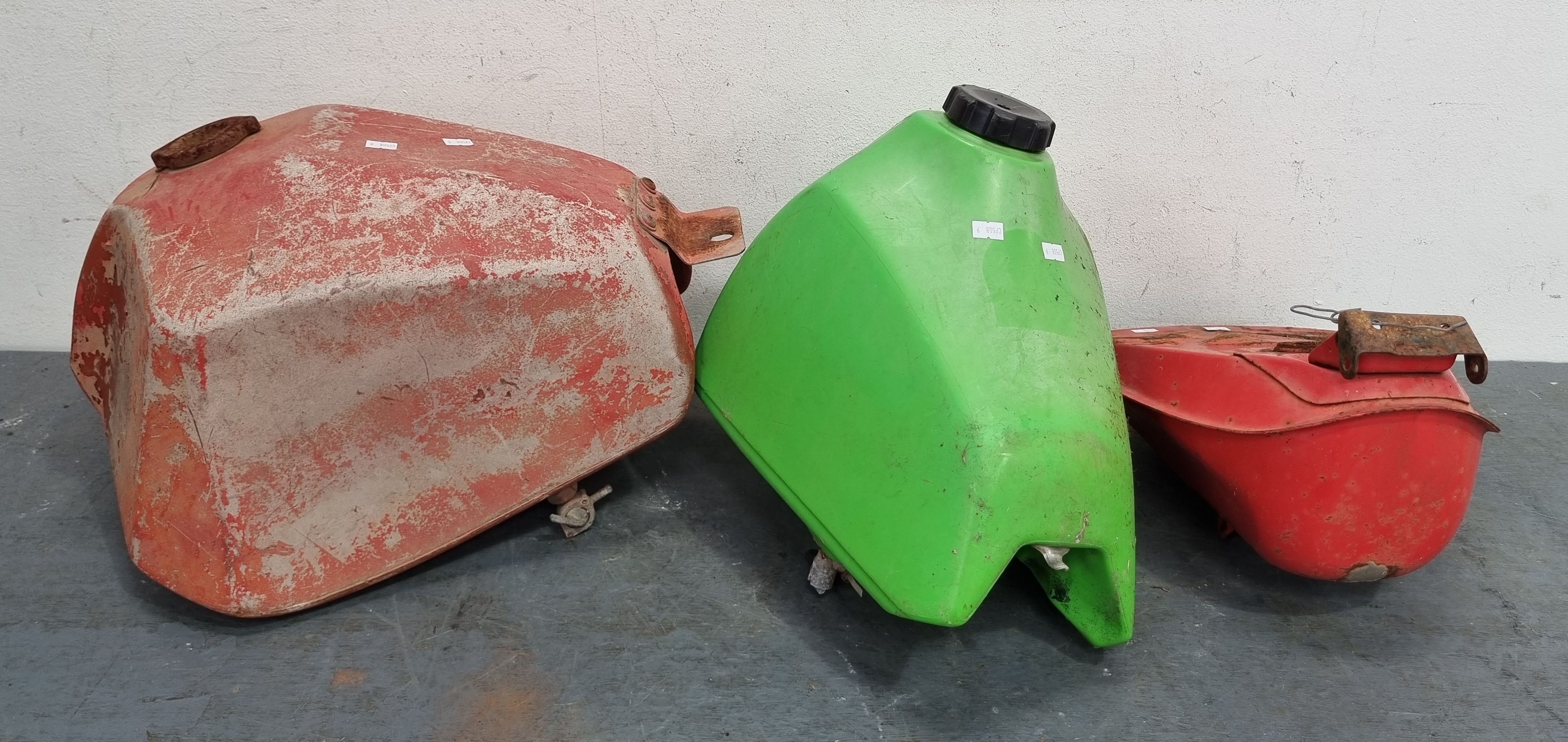 THREE MOTORBIKE TANKS