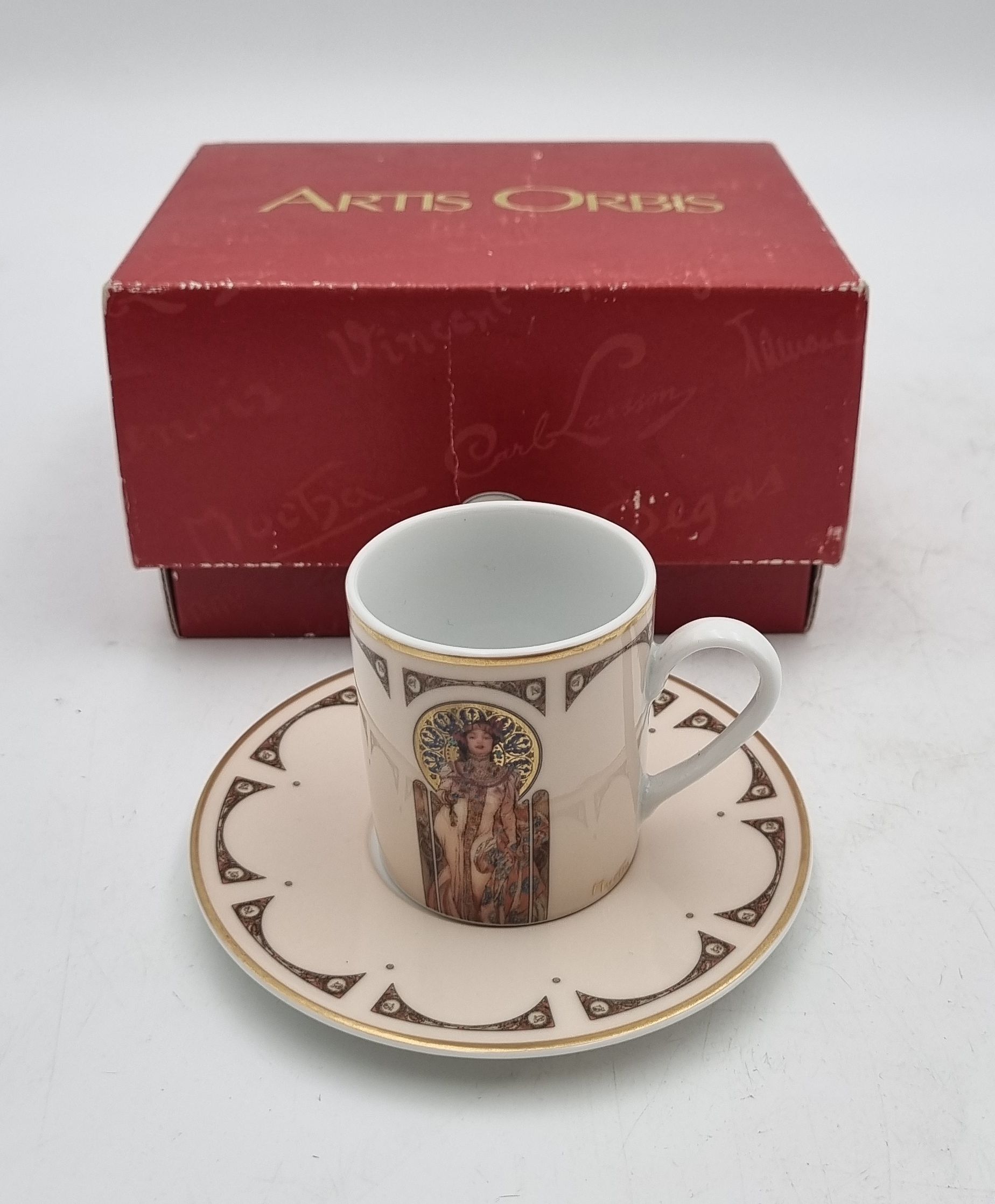 173 · A GOEBEL ARTIS ORBIS MUCHA COFFEE CAN AND SAUCER