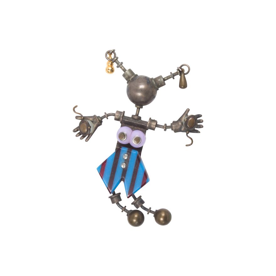 A Thomas Mann mixed media figural brooch, 1989