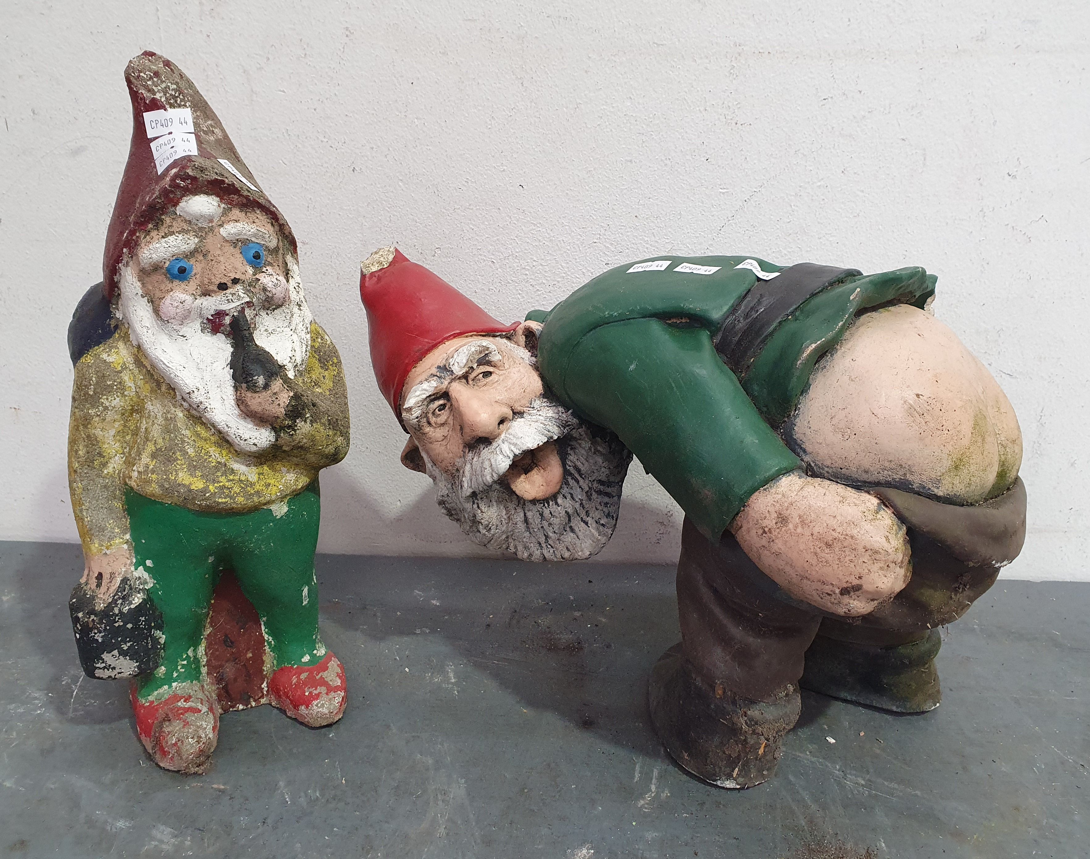1024 · TWO CONCRETE GNOMES