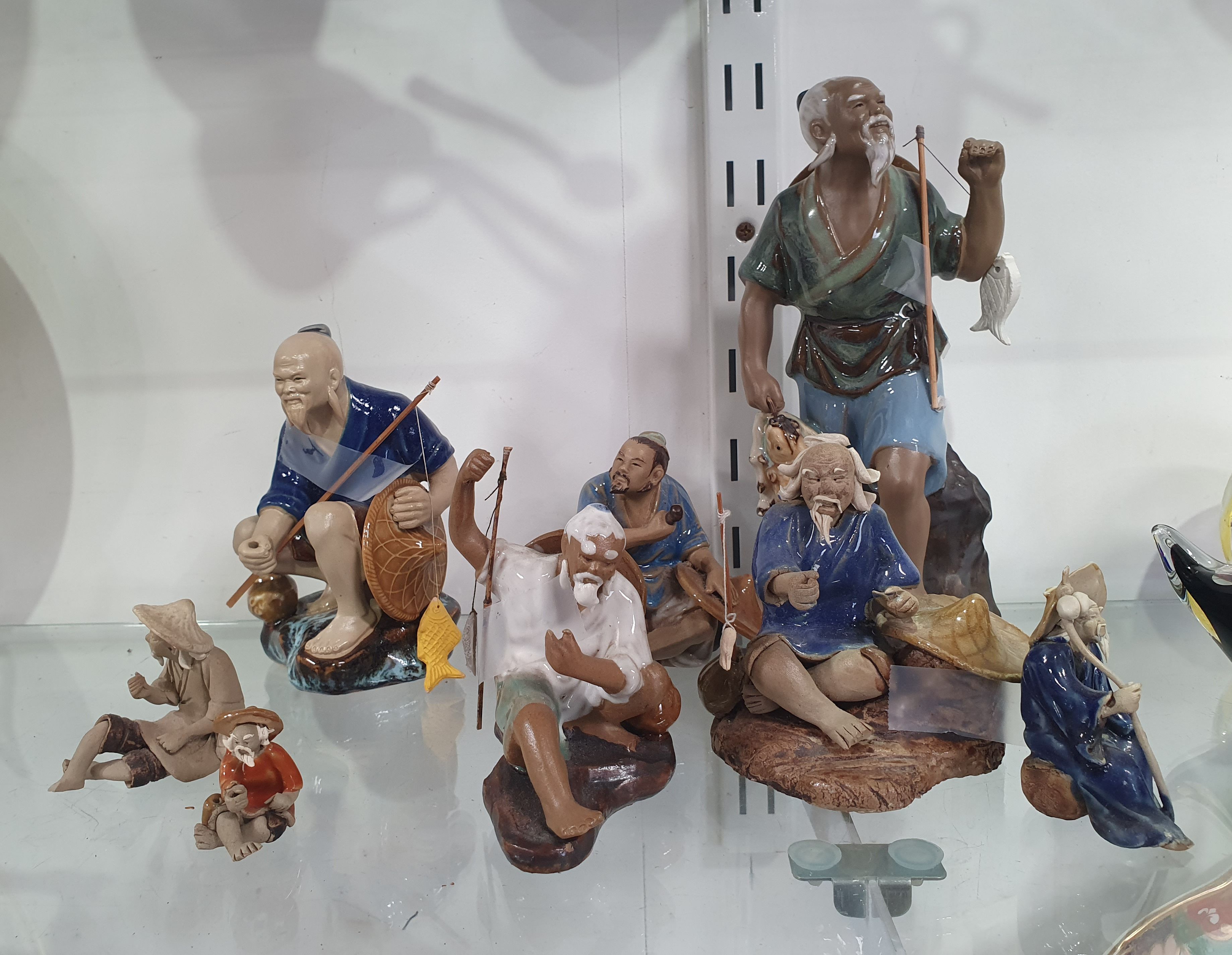 626 · EIGHT VARIOUS CHINESE SHIWAN POTTERY FIGURES