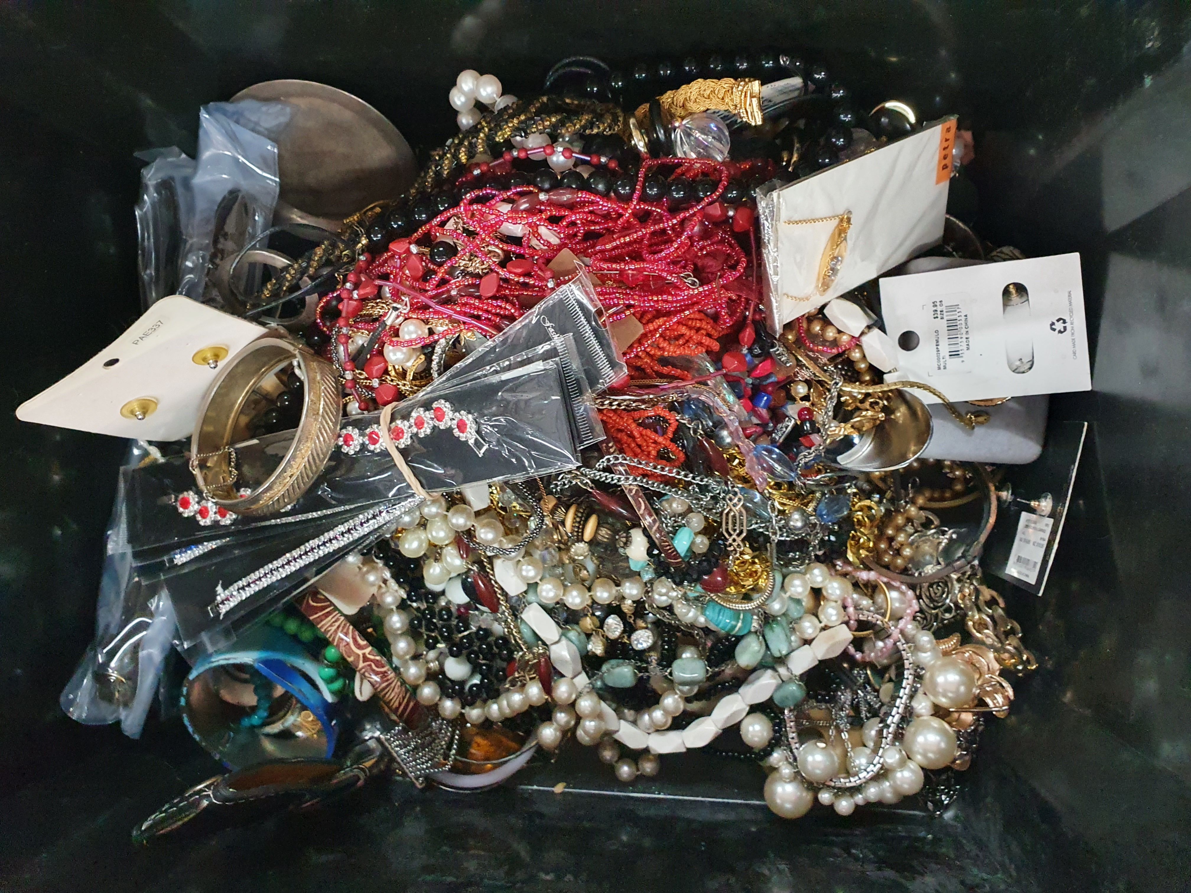 124 · A BOX OF COSTUME JEWELLERY