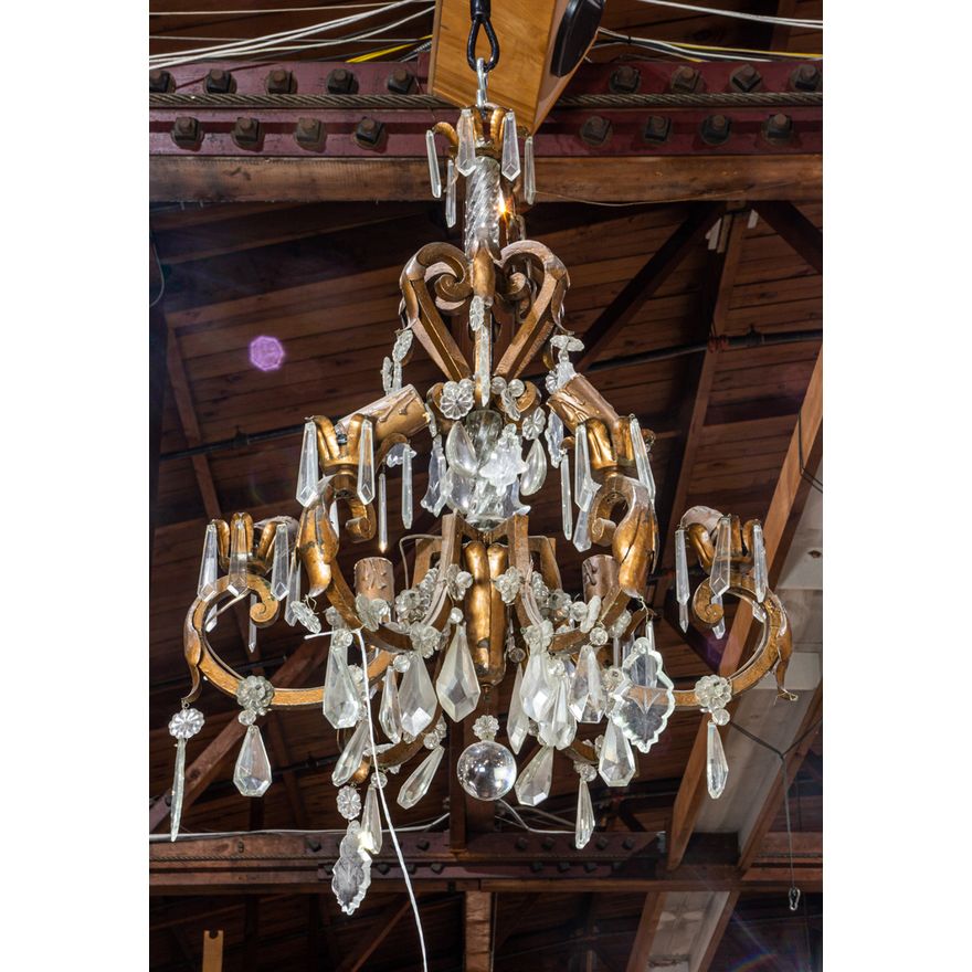 Continental crystal and patinated metal chandelier