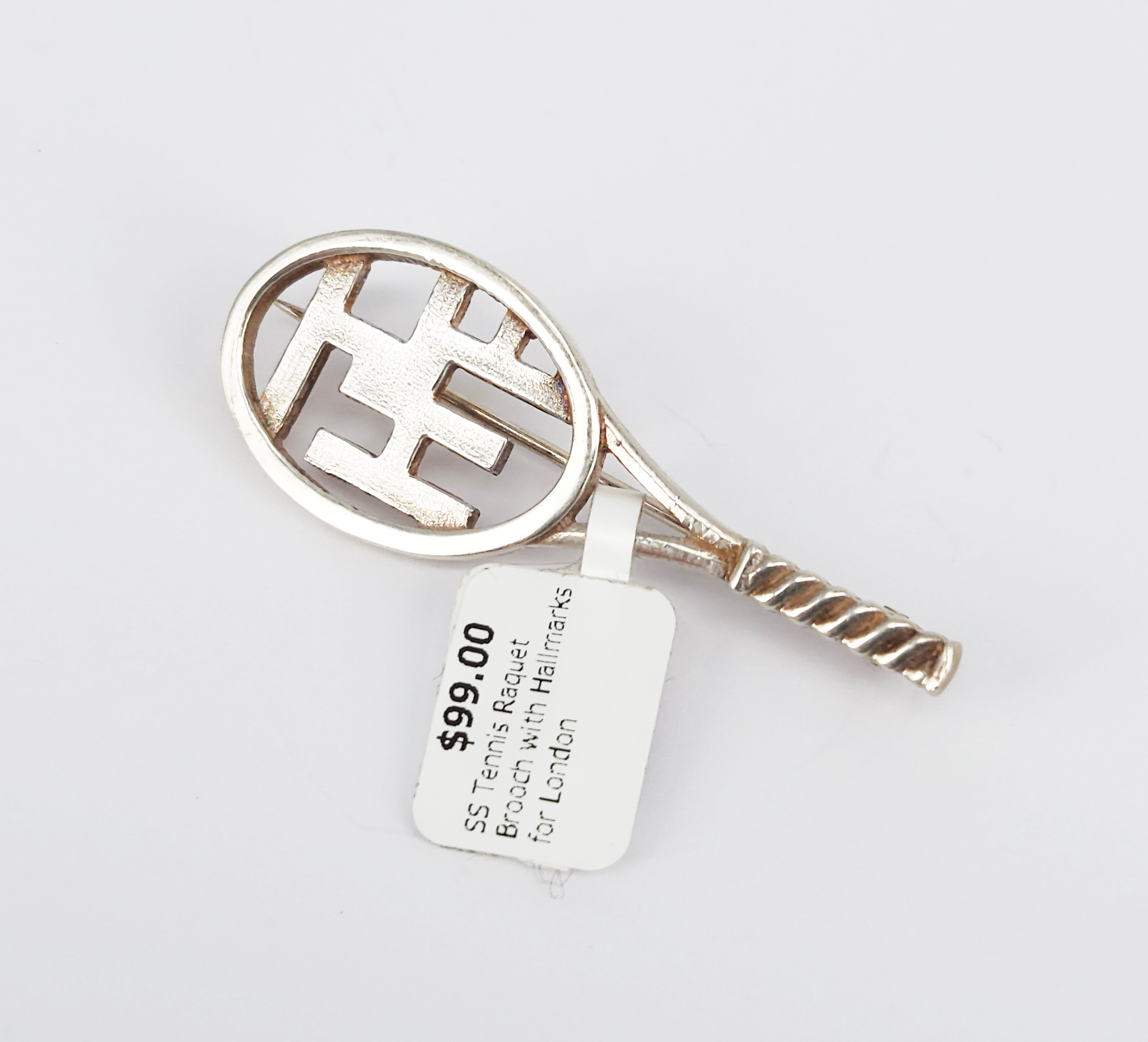 A Sterling Silver Tennis Brooch
