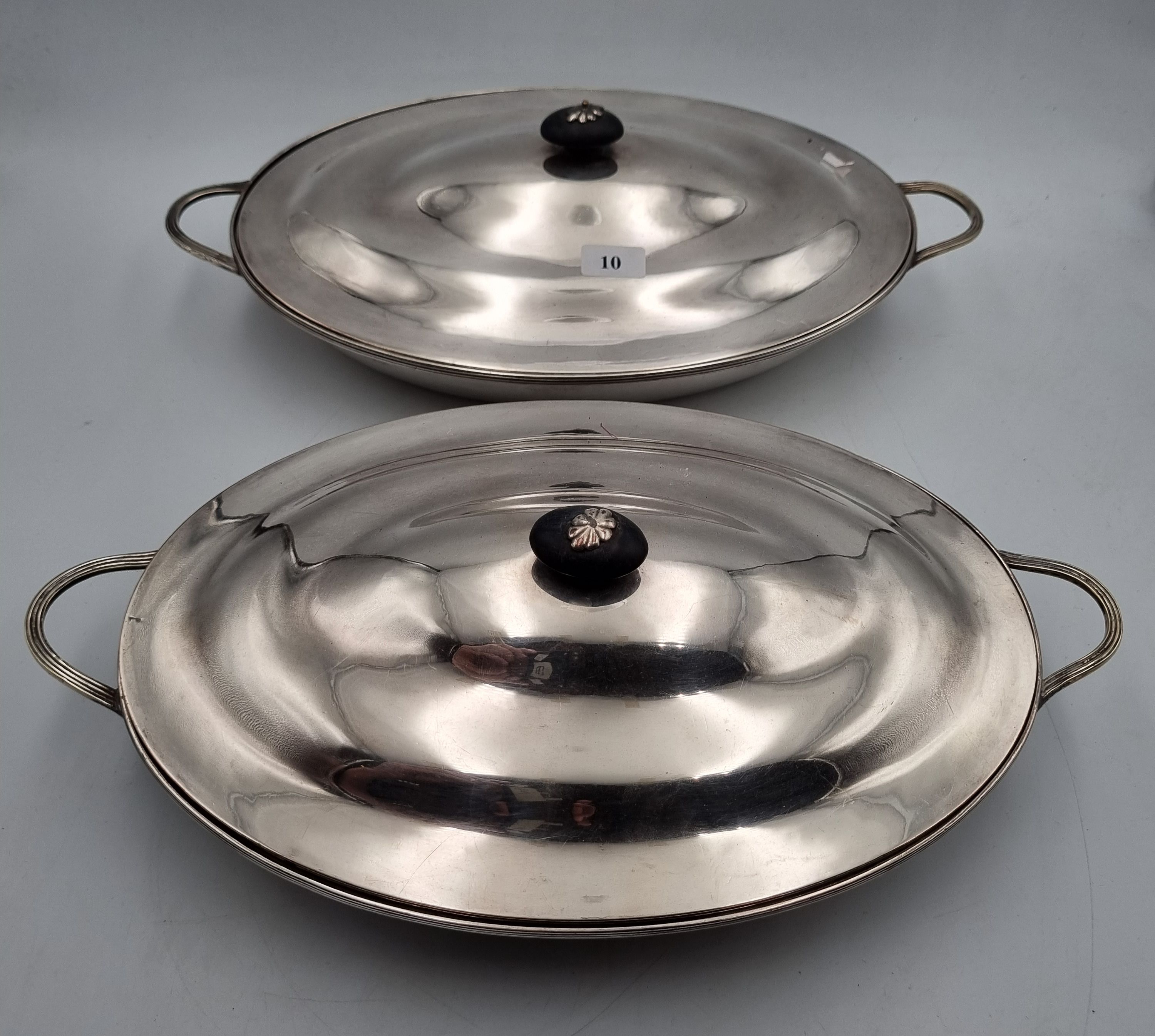 10 · A PAIR OF SHEFFIELD PLATED LIDDED TUREENS