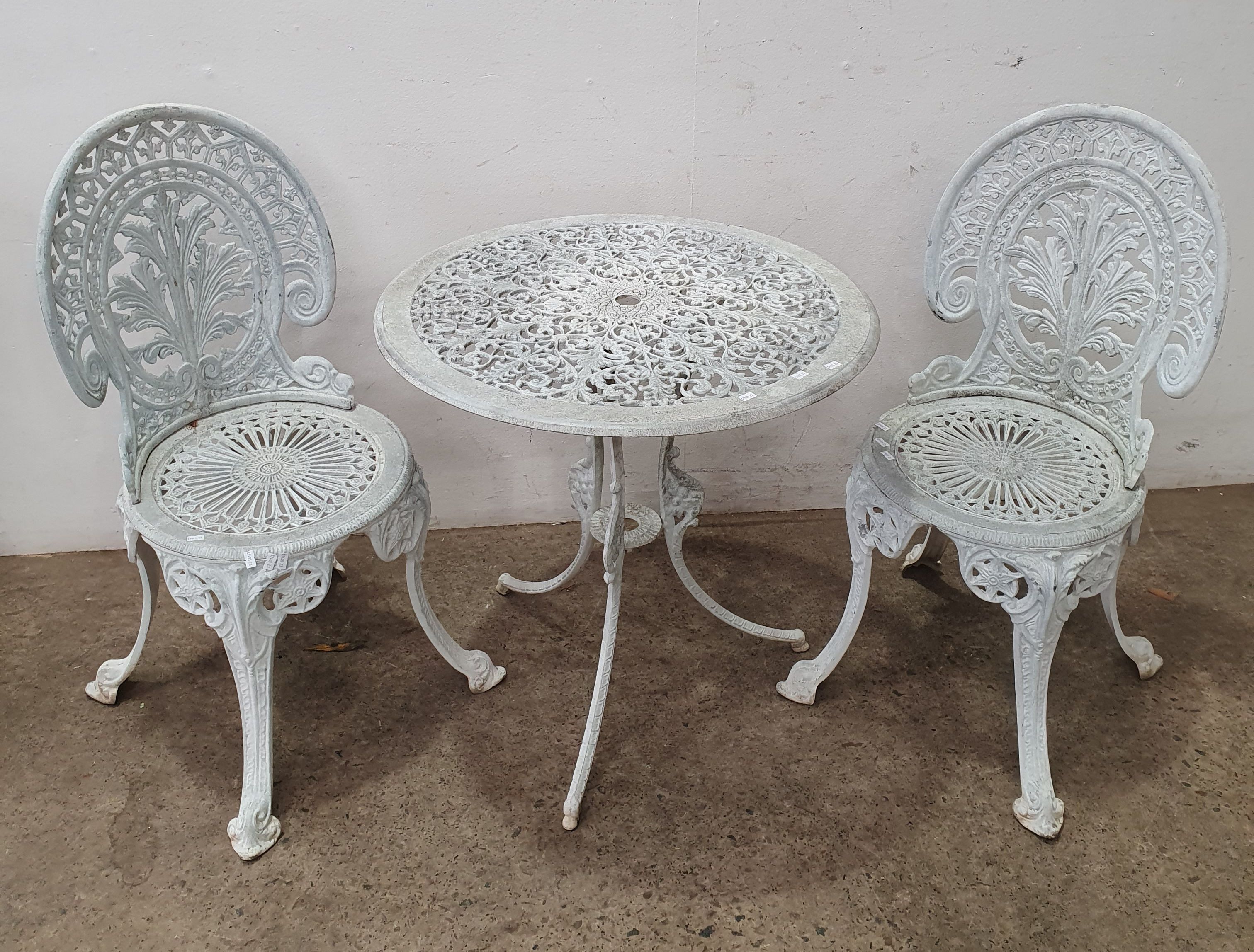 1047 · AN ALUMINIUM THREE PIECE OUTDOOR SETTING