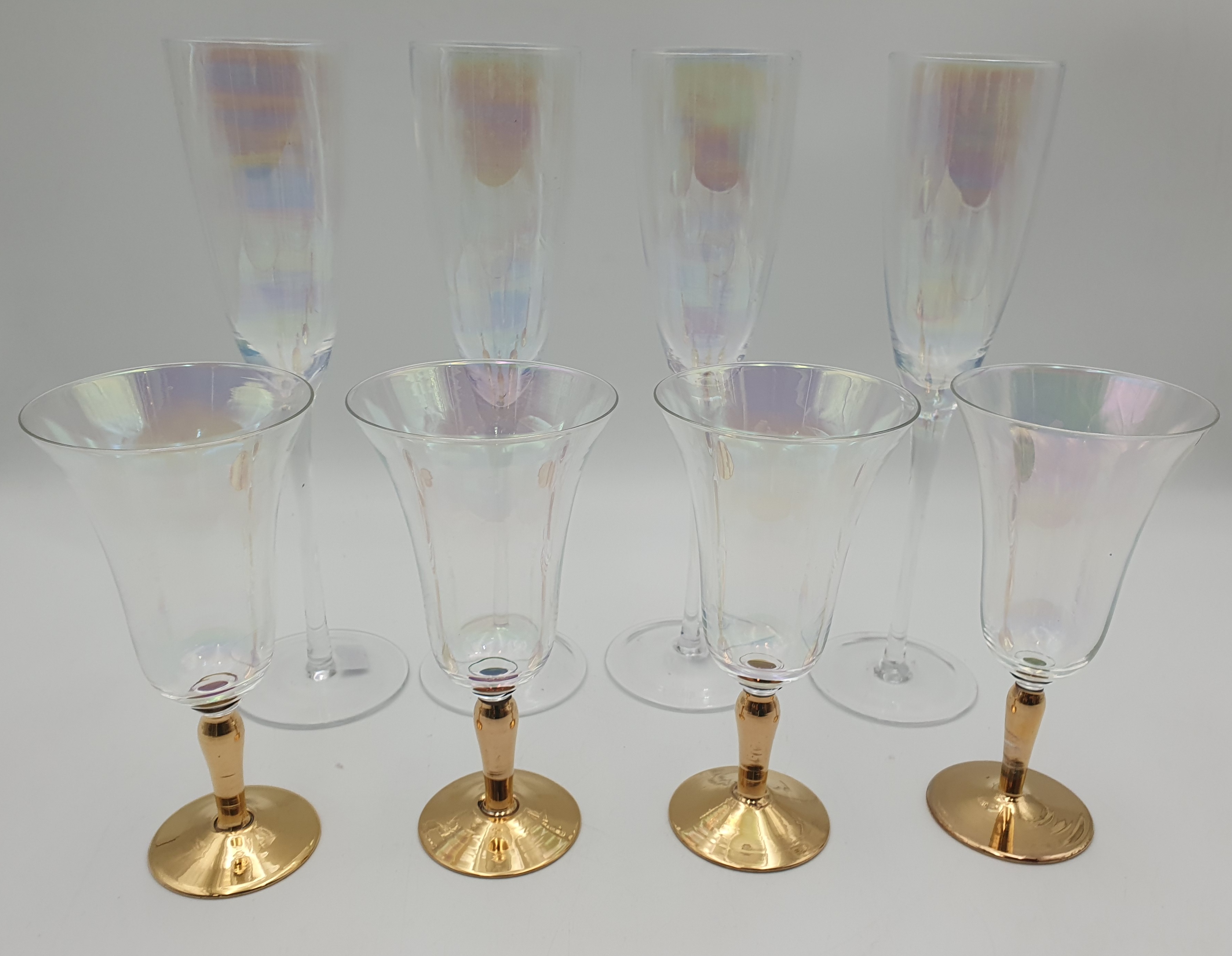 505 · EIGHT VARIOUS IRIDESCENT CHAMPAGNE GLASSES