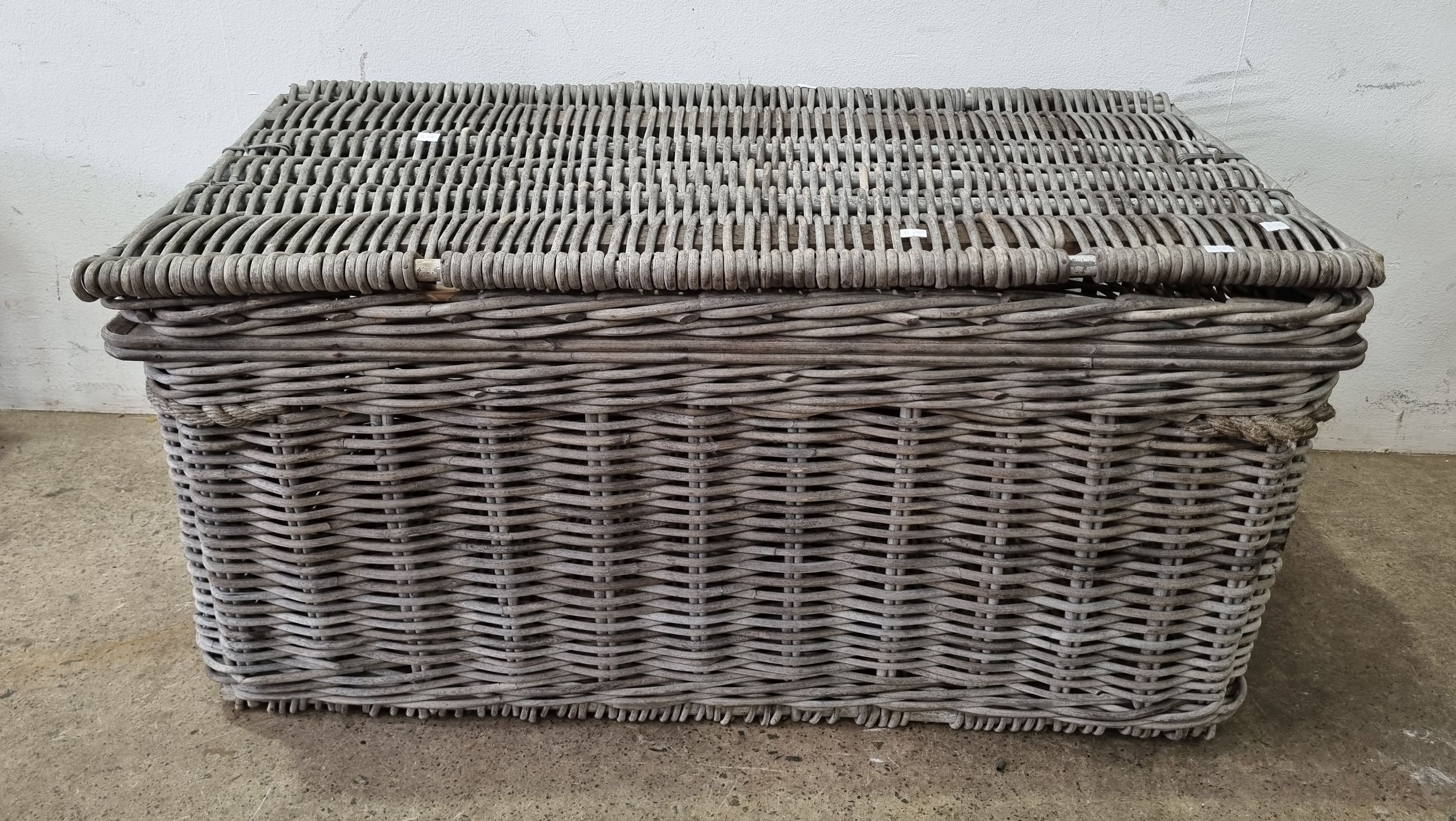 1180 · A WOVEN CANE BLANKET BOX