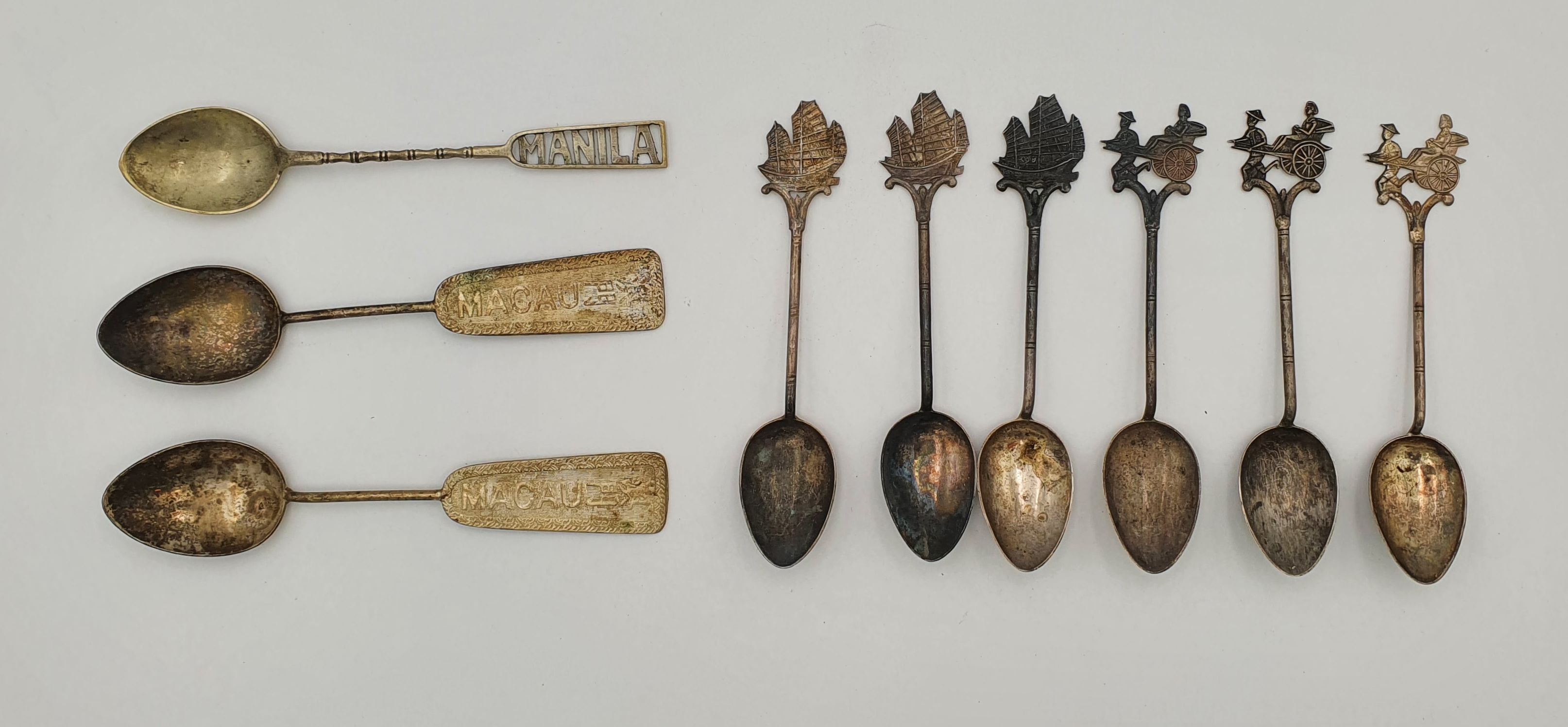 513 · A GROUP OF ASIAN SILVER MOCHA SPOONS