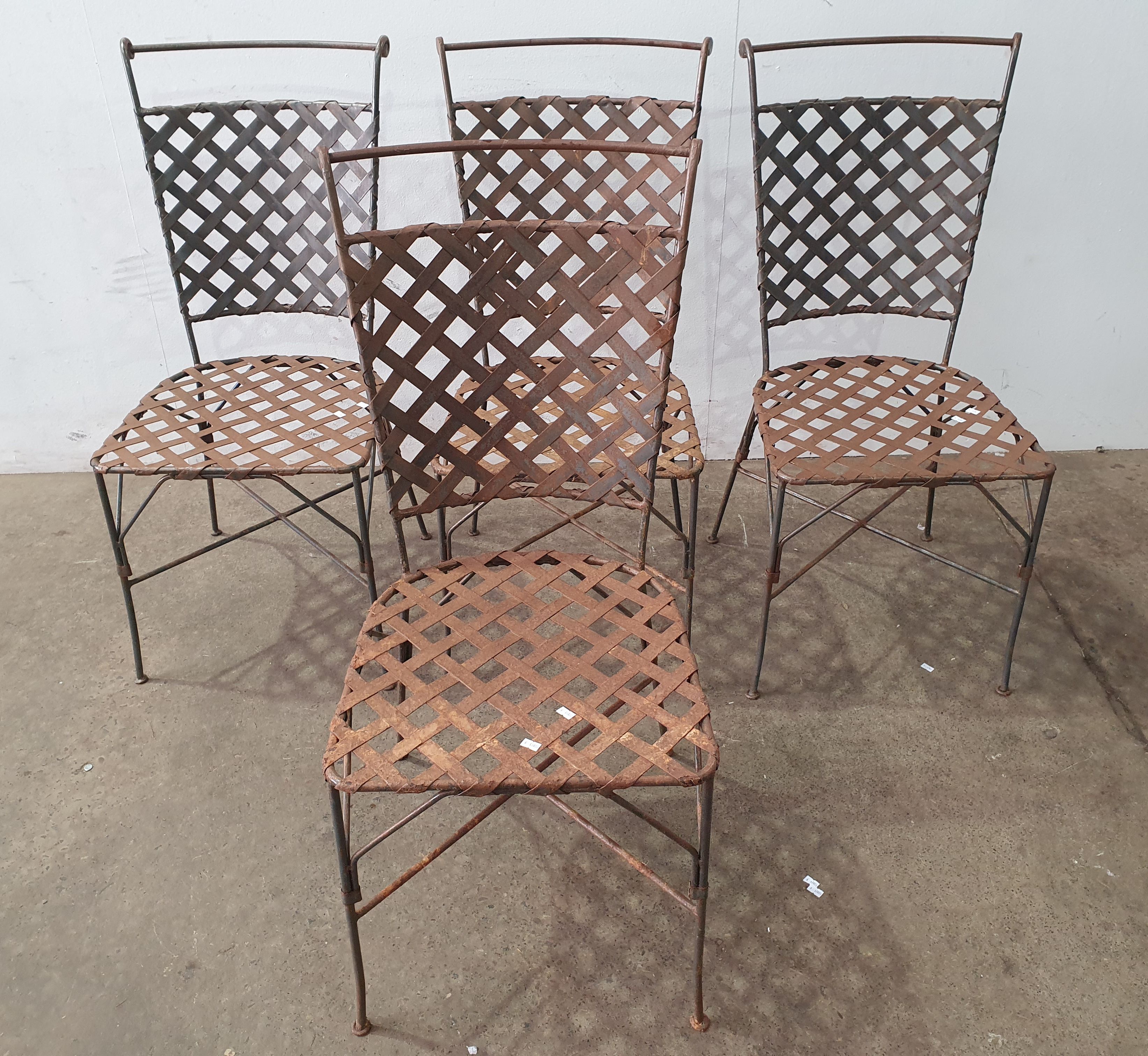 Four Wrought Iron Chairs