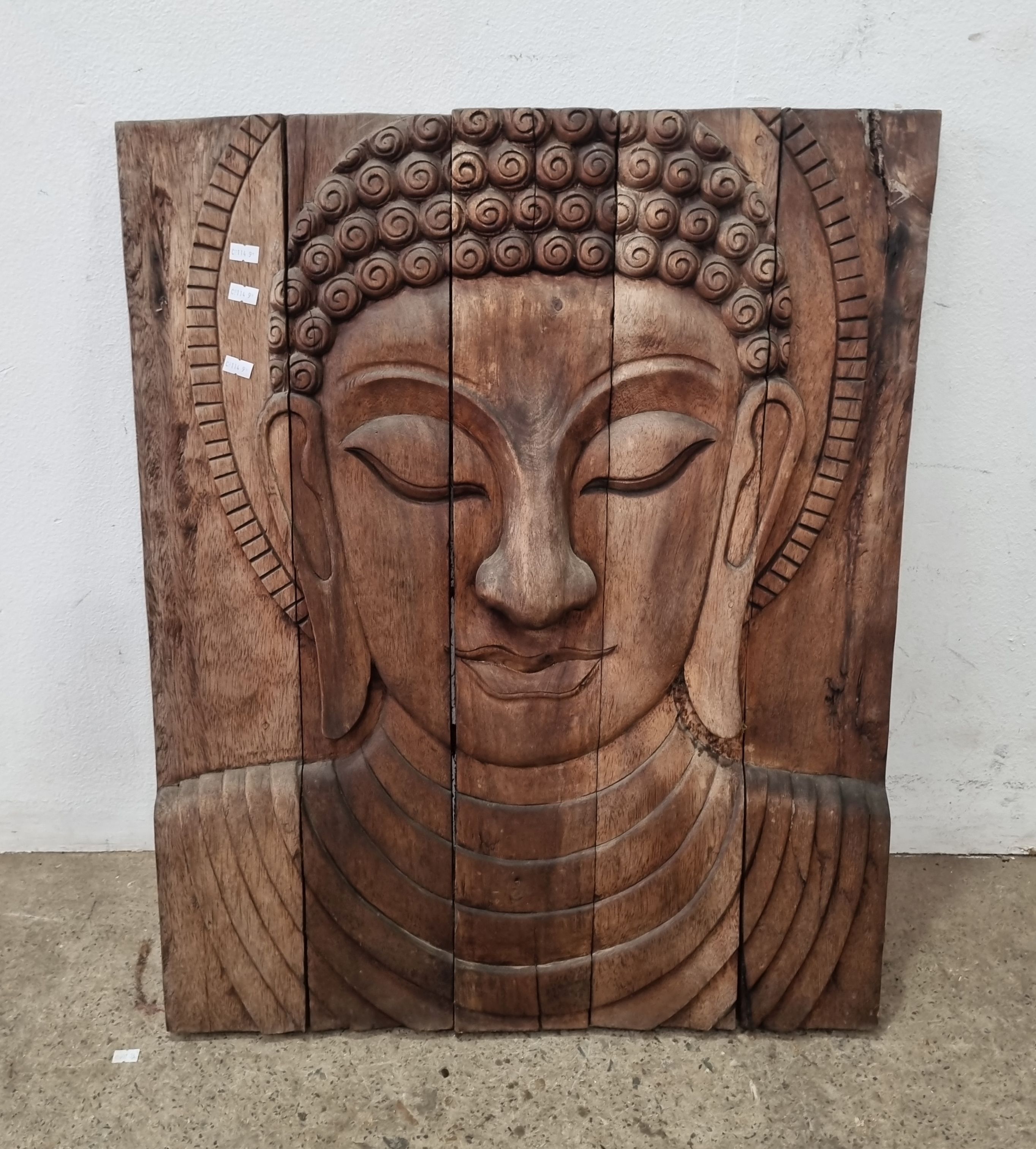 1194 · A TEAK CARVED BUDDHA BUST OUT DOOR WALL FEATURE