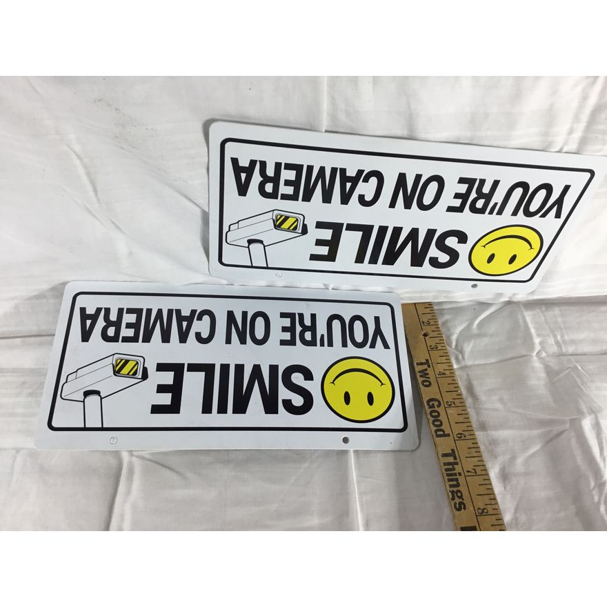 (Buying 2) "Smile You're On Camera" Plastic Signs 10" x 5"