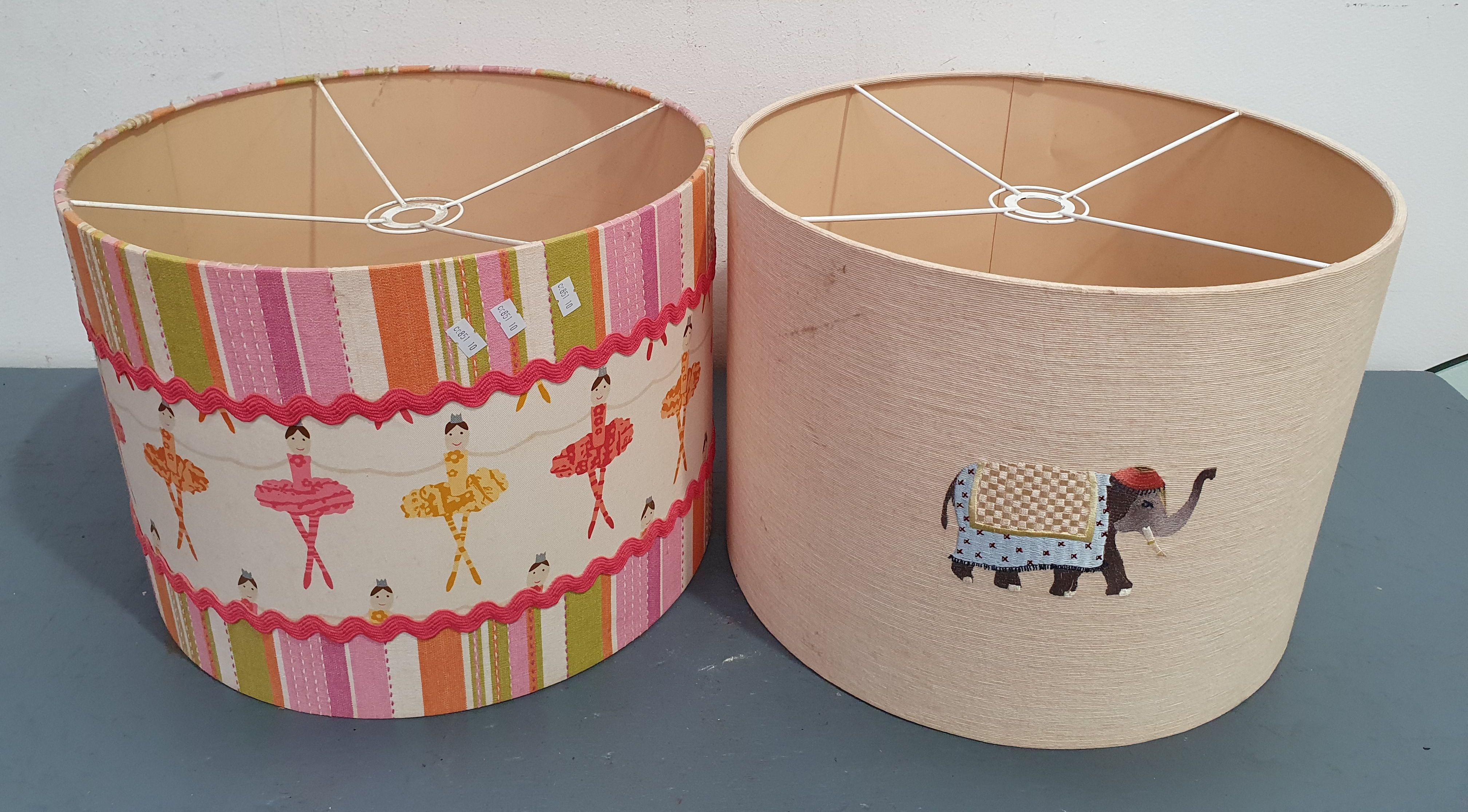 1222 · AN UNEVEN PAIR OF DECORATIVE LAMPSHADES