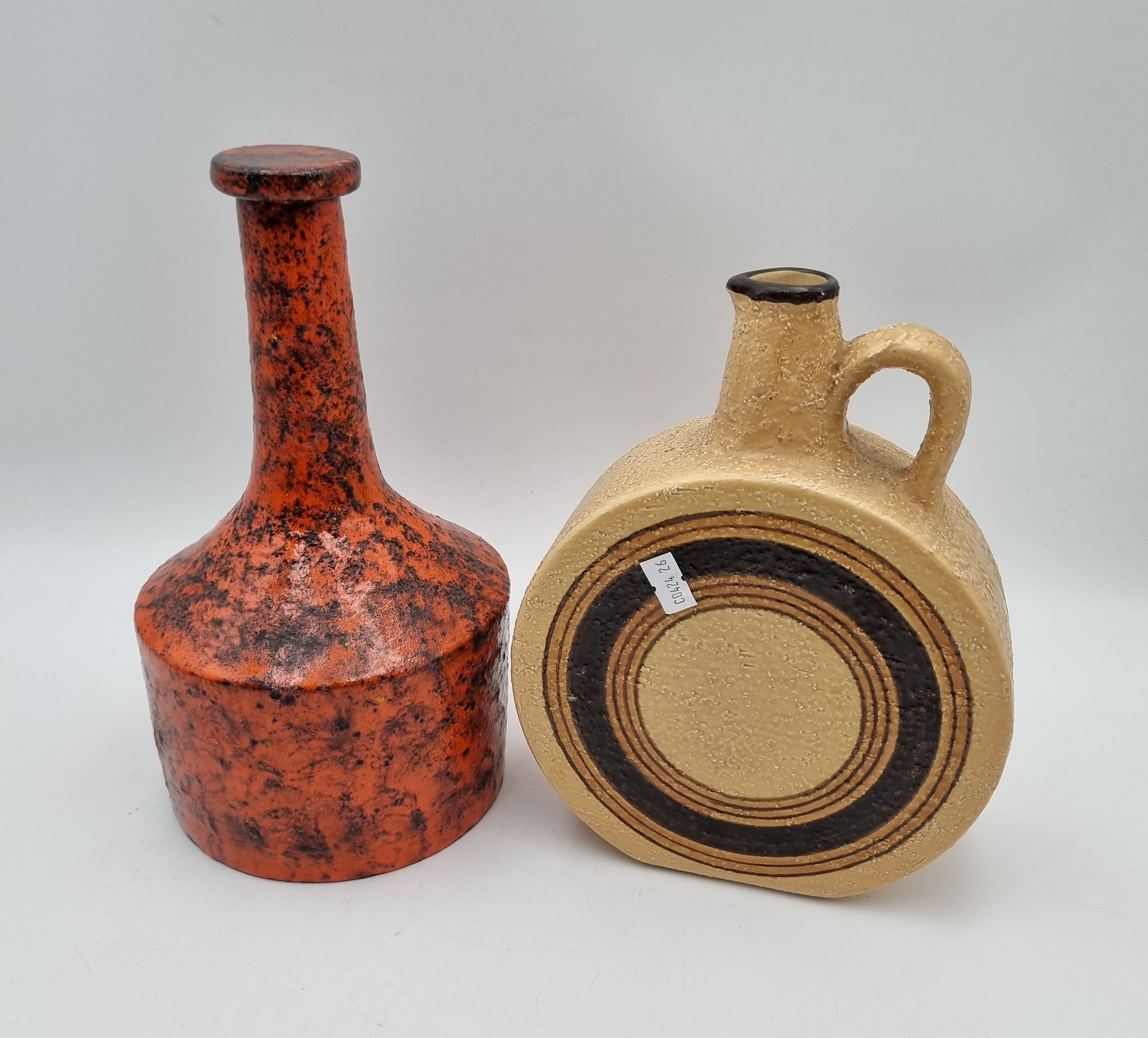 An Italian Pottery Decanter With Stopper