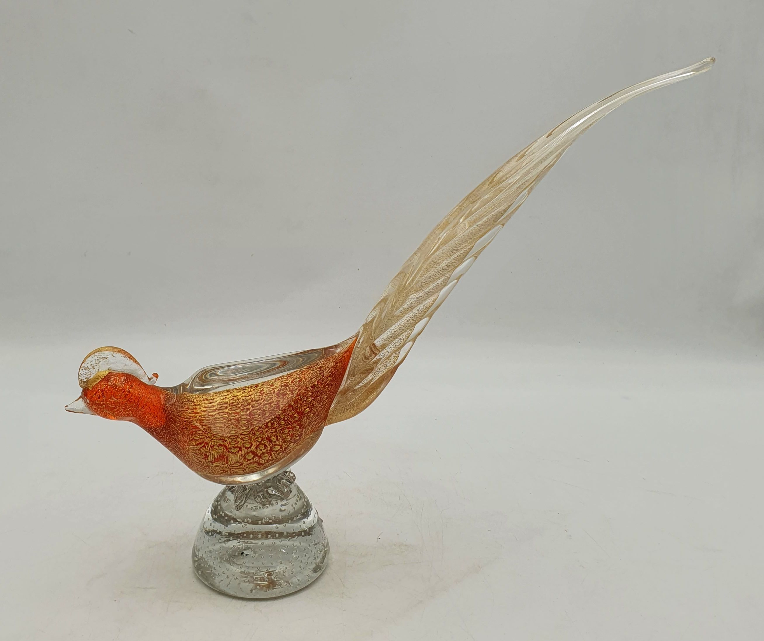 AN ART GLASS AMBER PHEASANT FIGURE