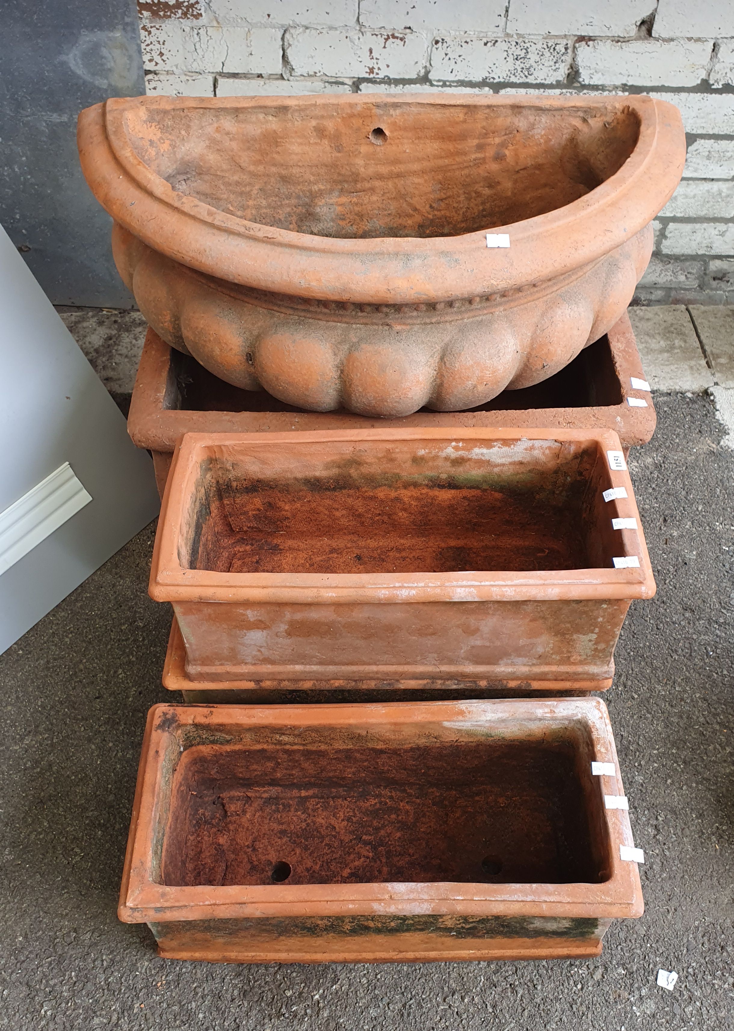1151 · A GROUP OF TERRACOTTA POTS