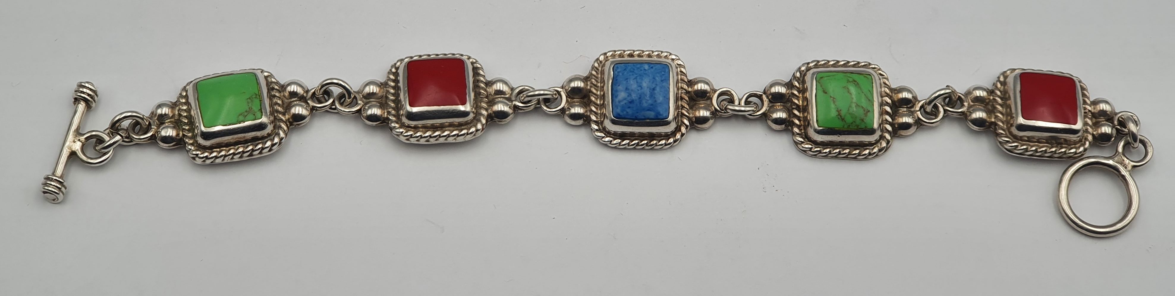 261 · A MEXICAN SILVER INLAID BRACELET