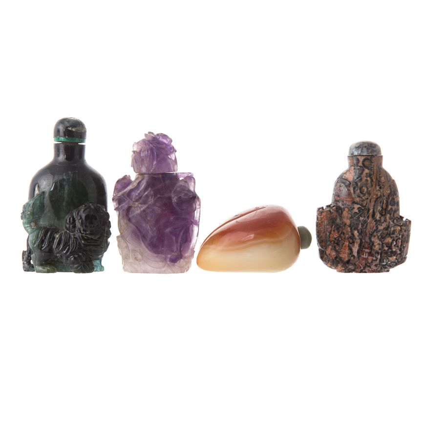 Four Chinese Carved Hardstone Snuff Bottles