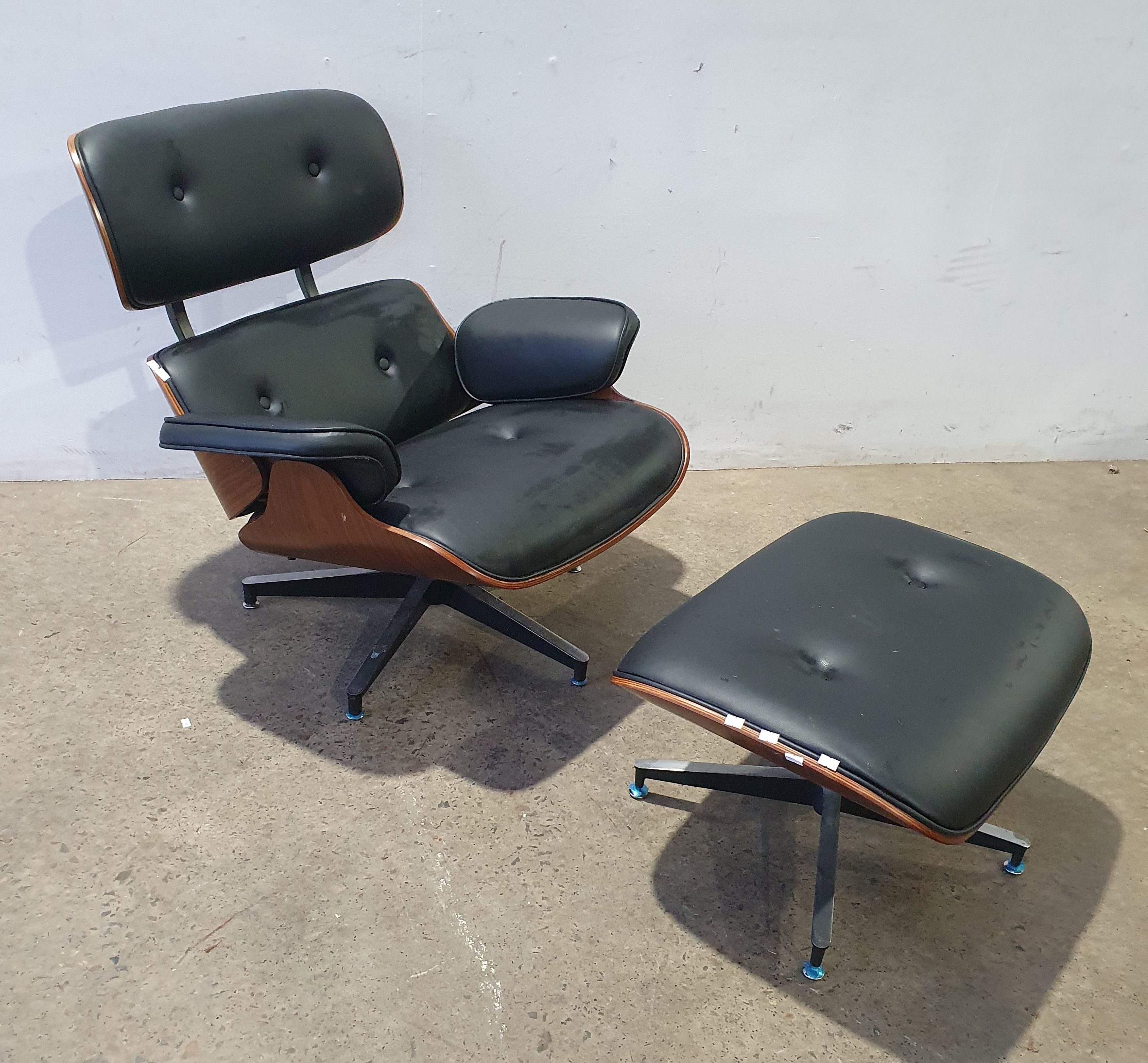 2107 · AN EAMES STYLE CHAIR