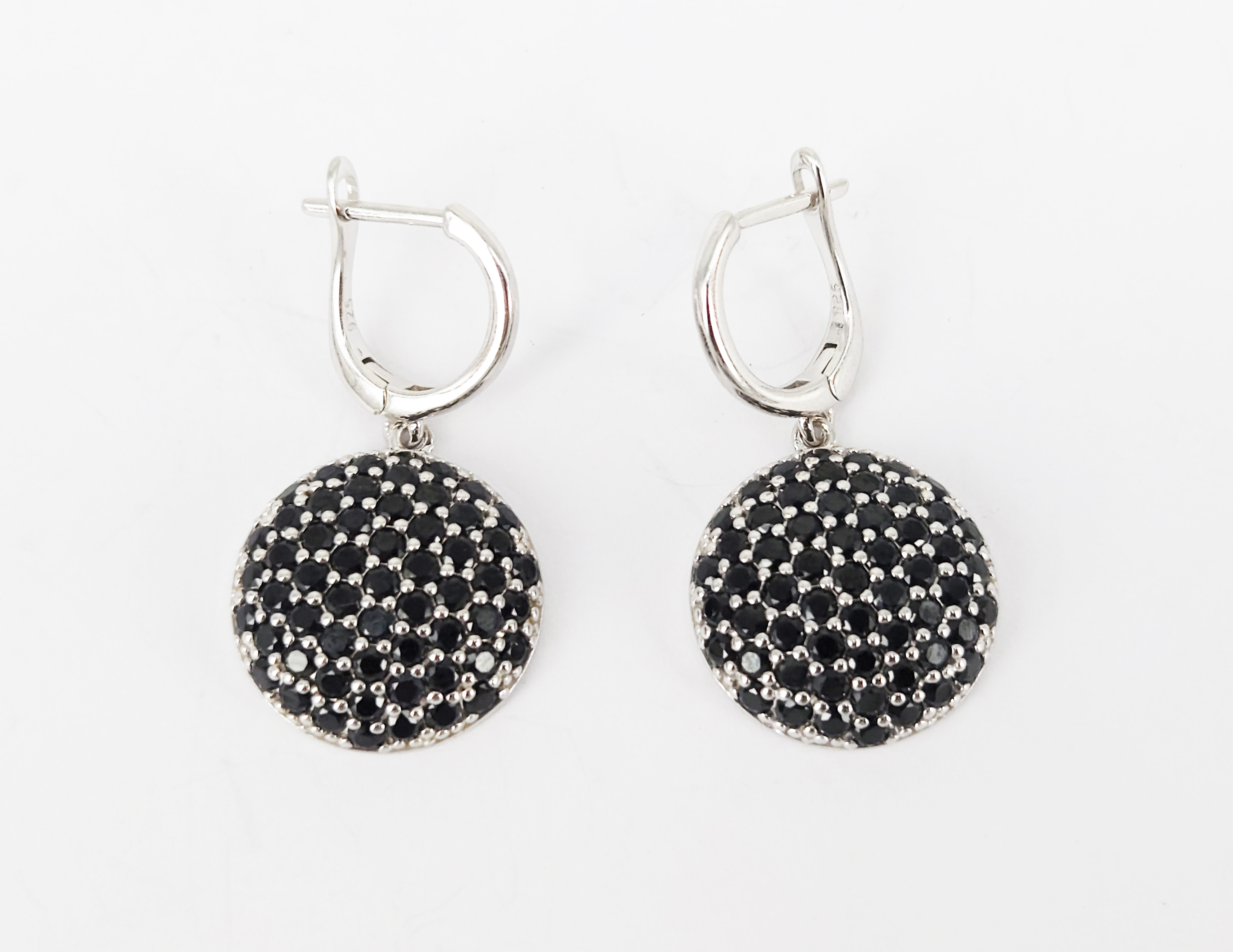 A Pair Of Silver And Sapphire Cluster Drop Earrings