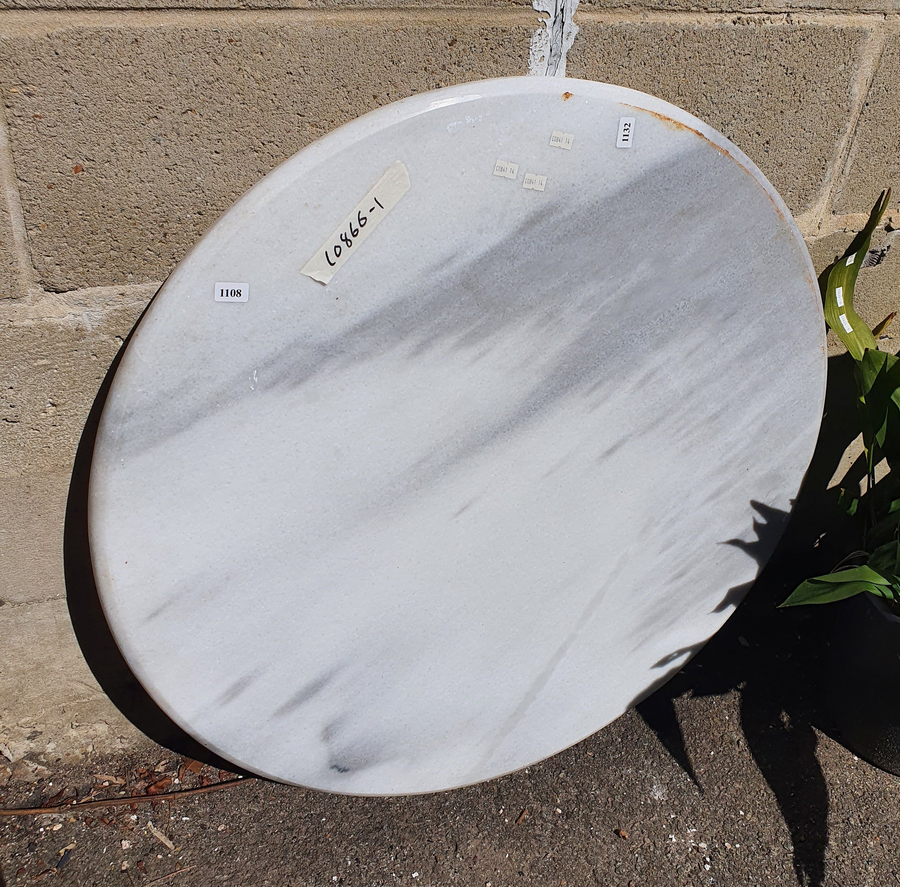 1108 · A SLAB OF CIRCULAR MARBLE