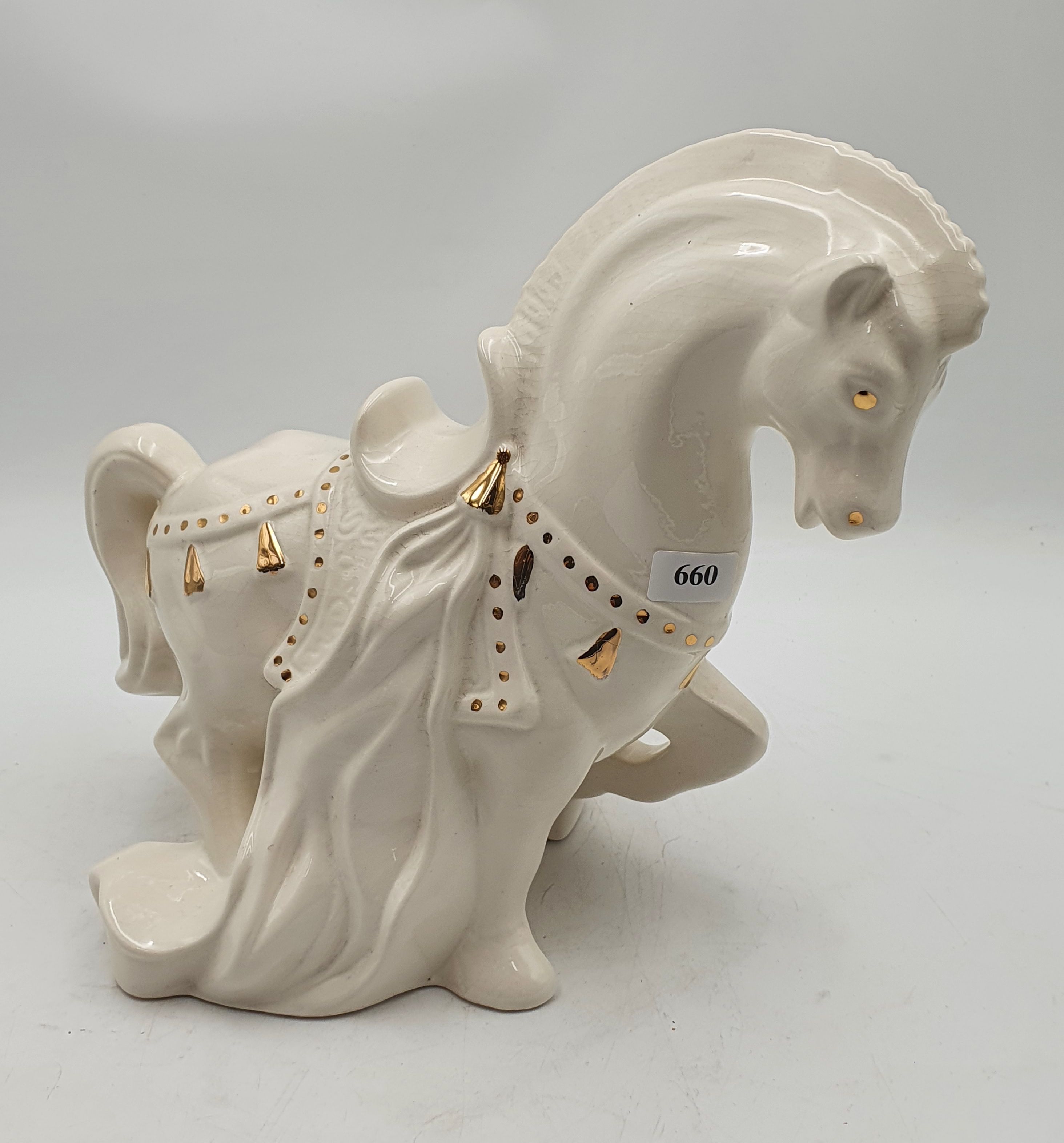 174 · AN AUSTRALIAN CERAMIC HORSE FIGURE