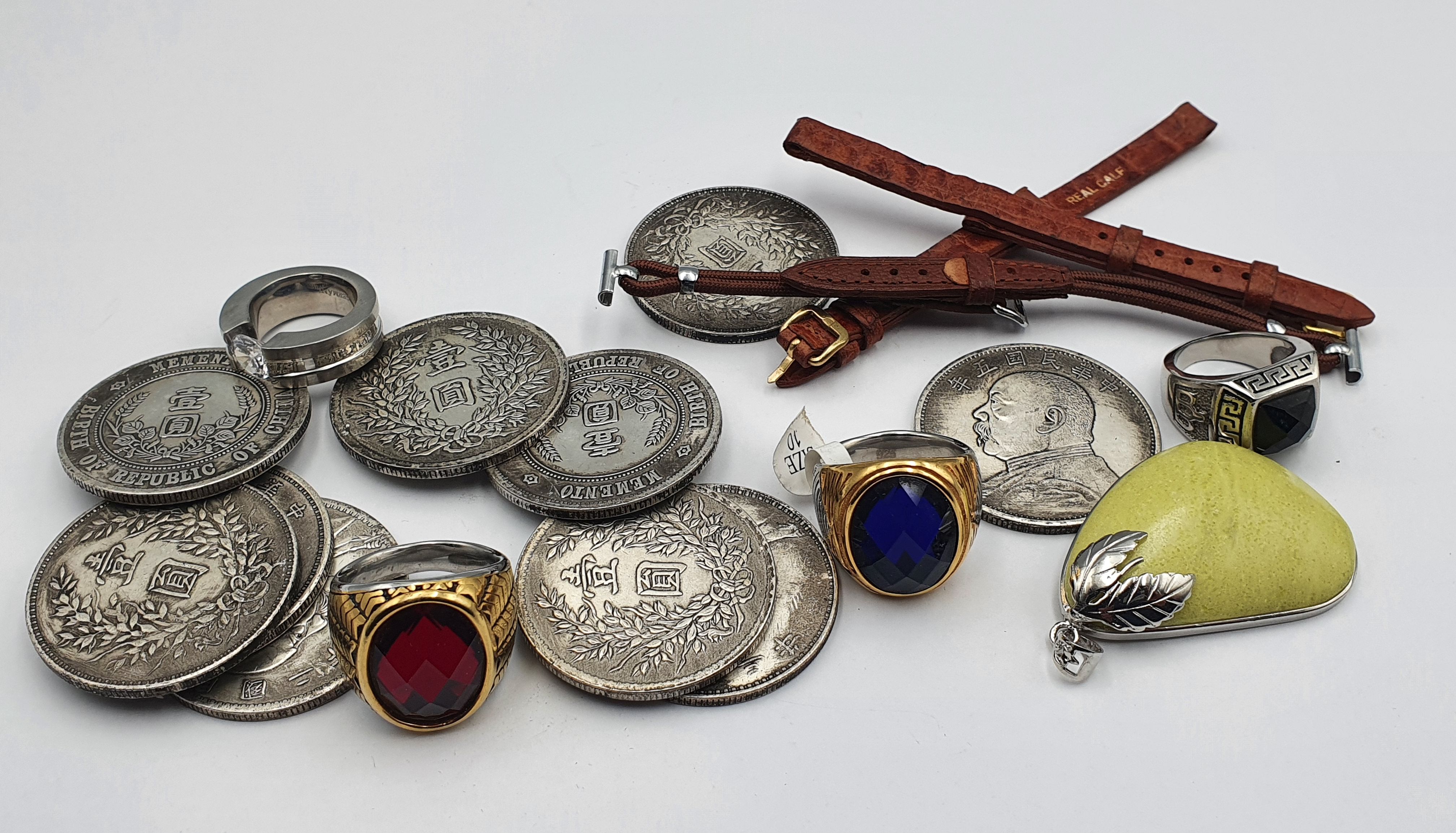 TEN CHINESE WHITE METAL MEDALLIONS FOUR RINGS & A PENDANT AND FIVE WATCH STRAPS