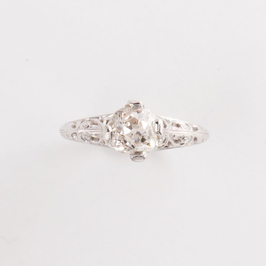 A diamond and eighteen karat white gold ring