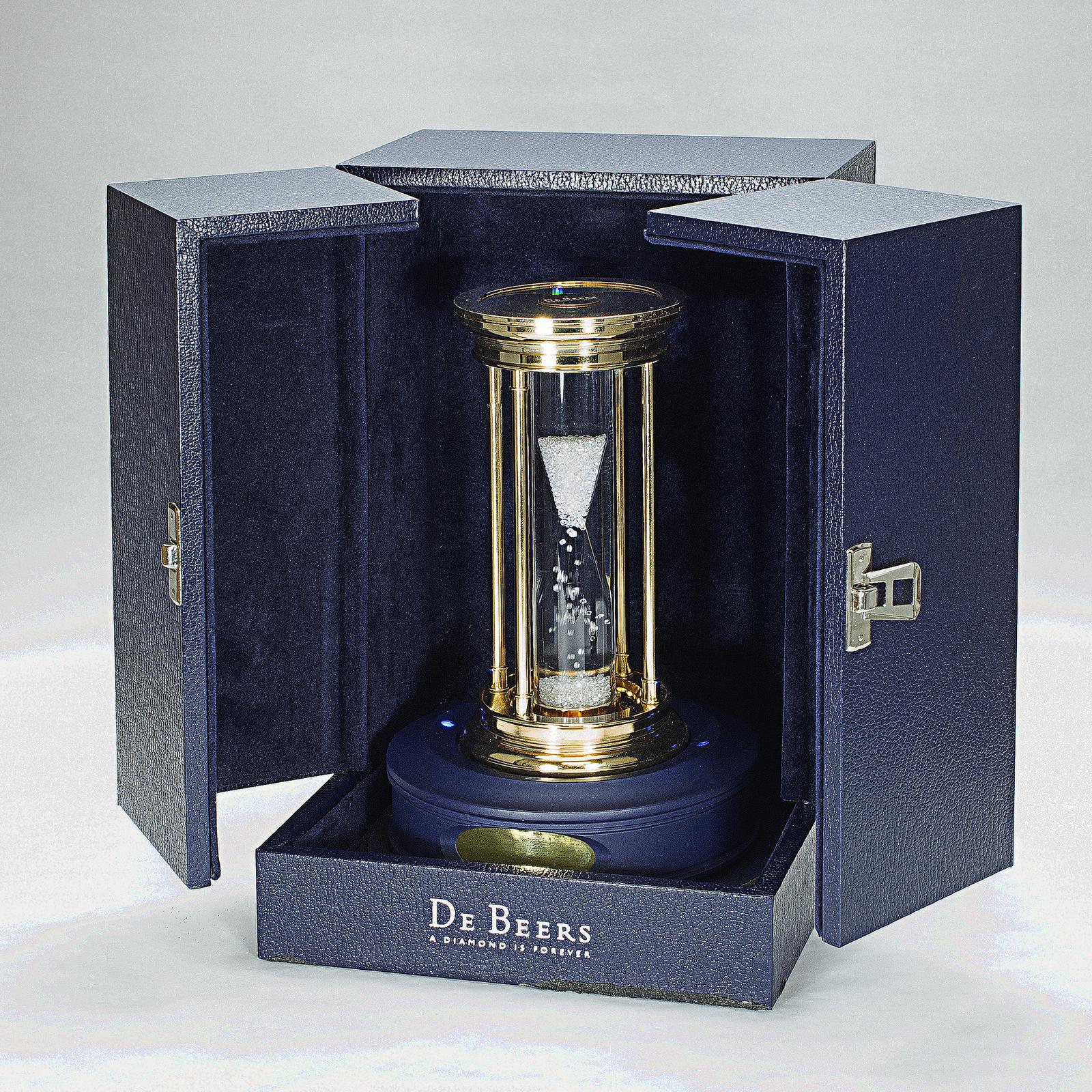 Sold at Auction: De Beers, De Beers Diamond, Gold Plated Brass