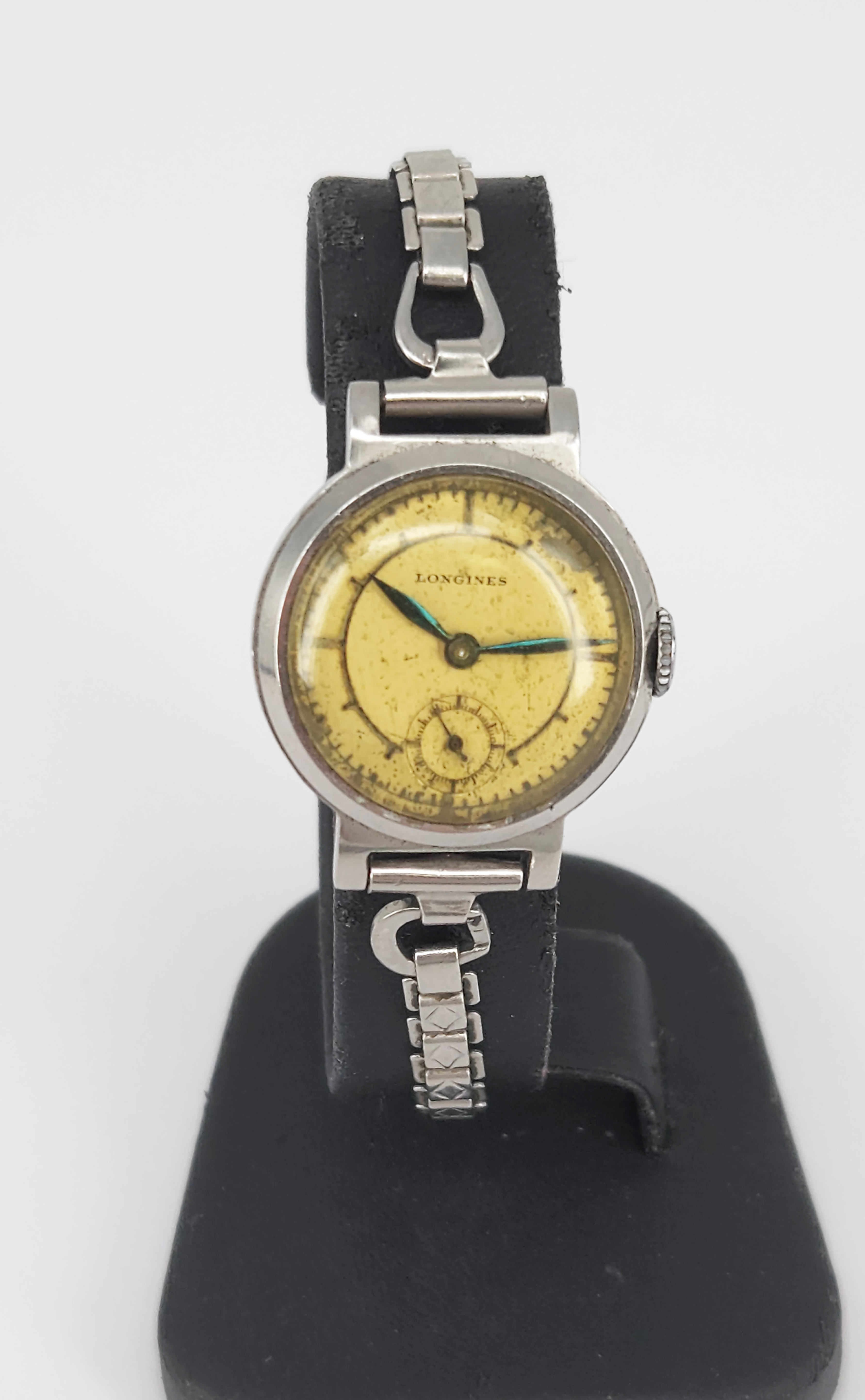 277 · AN EARLY LONGINES STAINLESS STEEL BRACELET WATCH