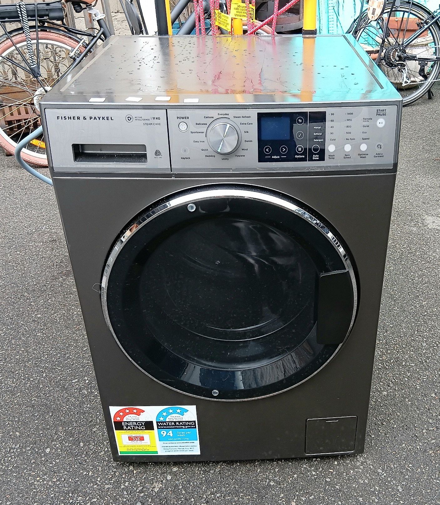 1216 · A FISHER AND PAYKEL FRONT LOAD WASHING MACHINE