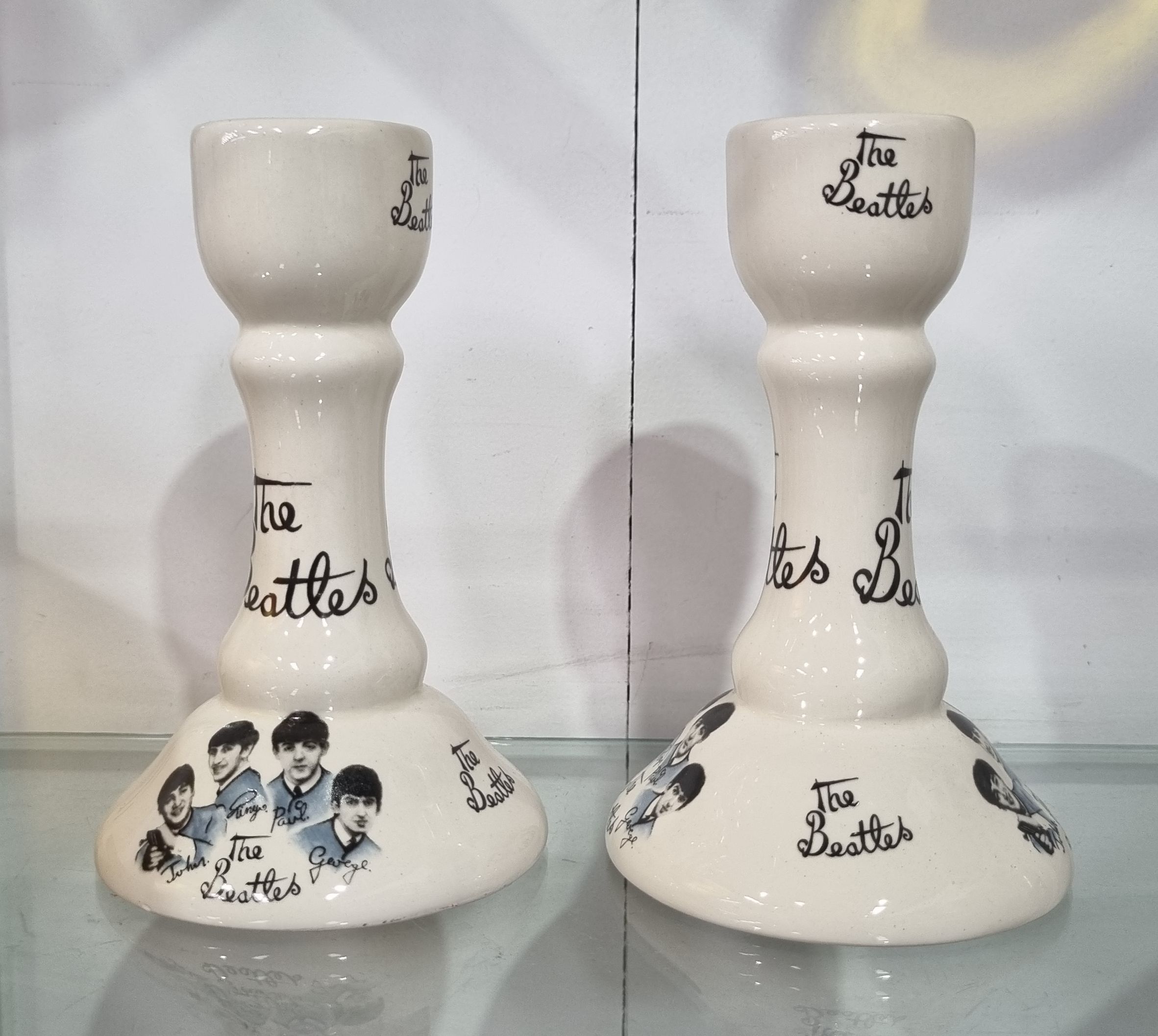 A PAIR OF BEATLES CANDLESTICKS