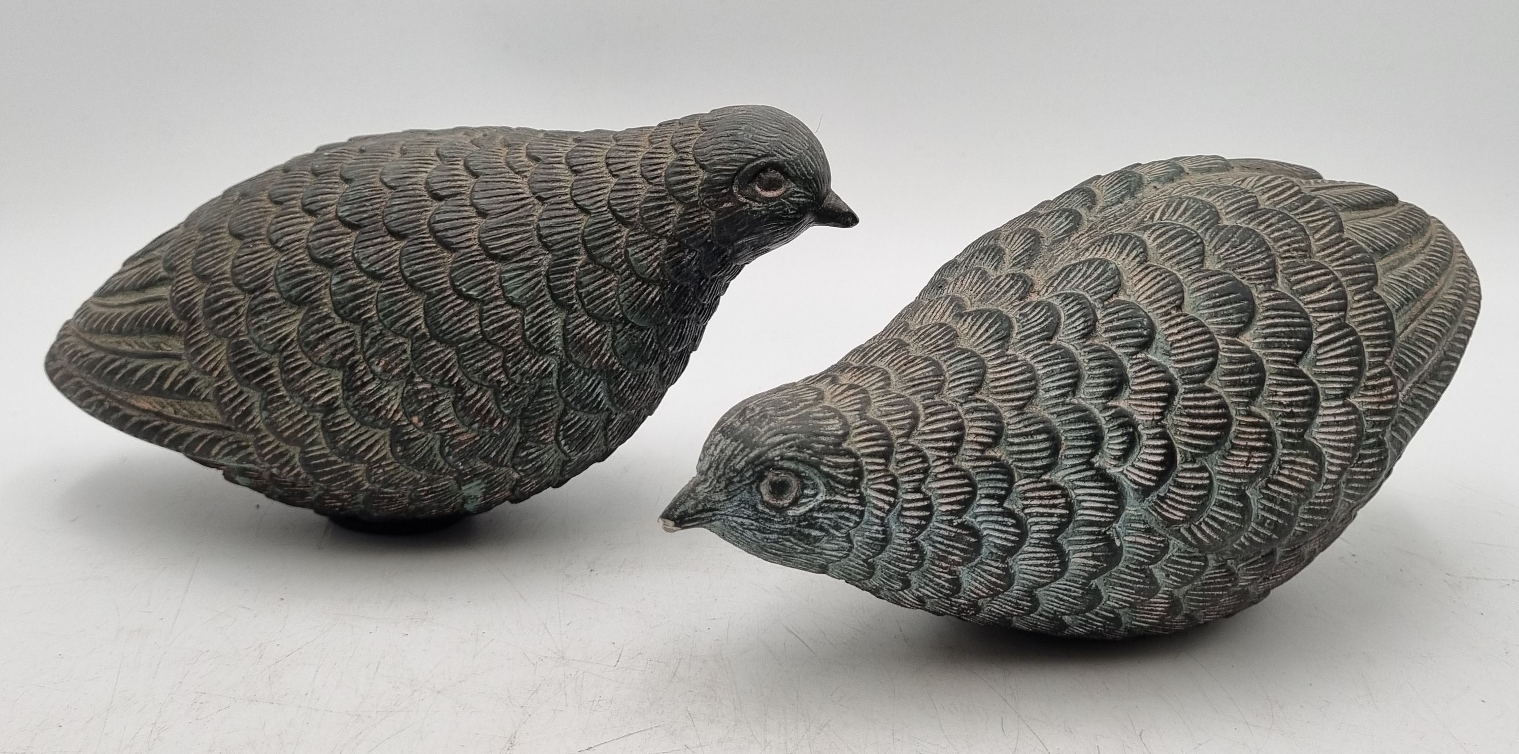 647 · A PAIR OF DECORATIVE QUAIL FIGURES