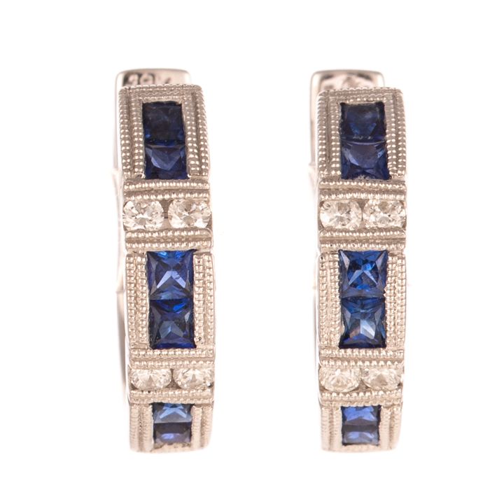 A Pair of Diamond & Sapphire Huggies in 18K