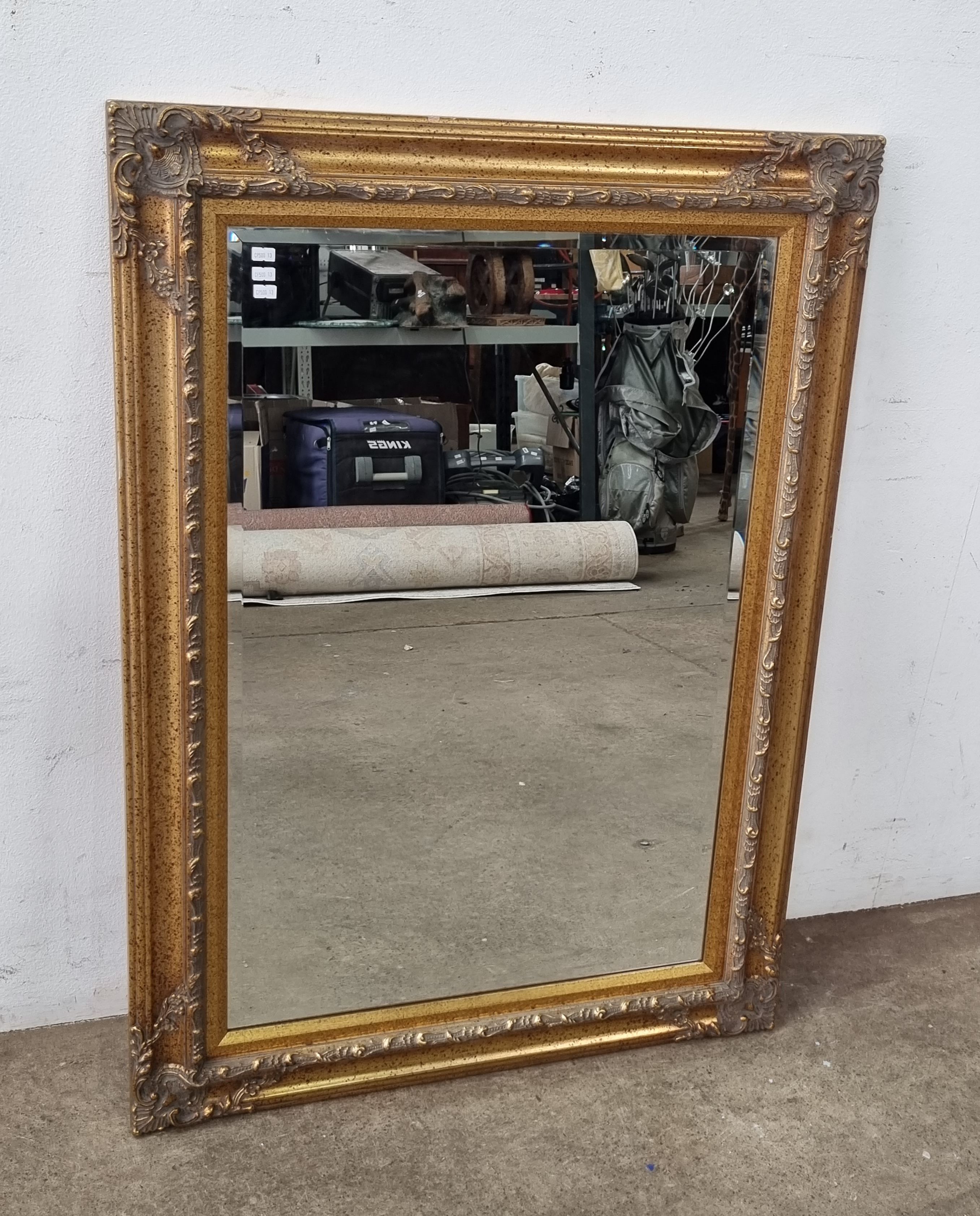 A Large Gilt Framed Bevelled Mirror