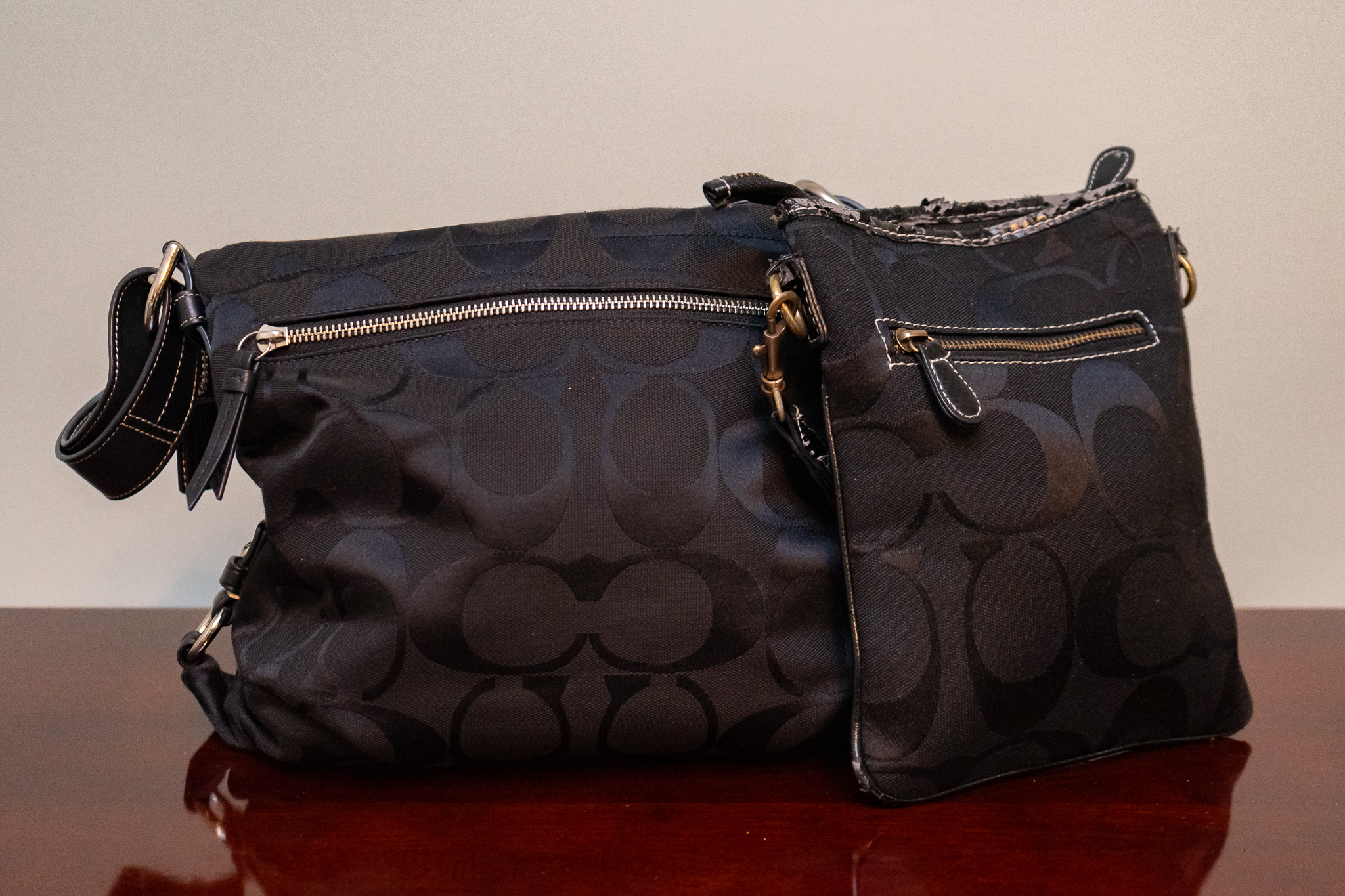 Two Black Coach Purses Harritt Group, Inc