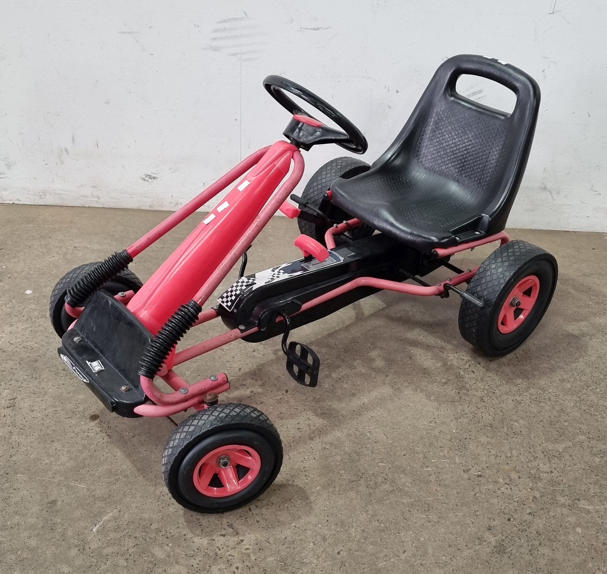 A KIDS PEDAL CAR