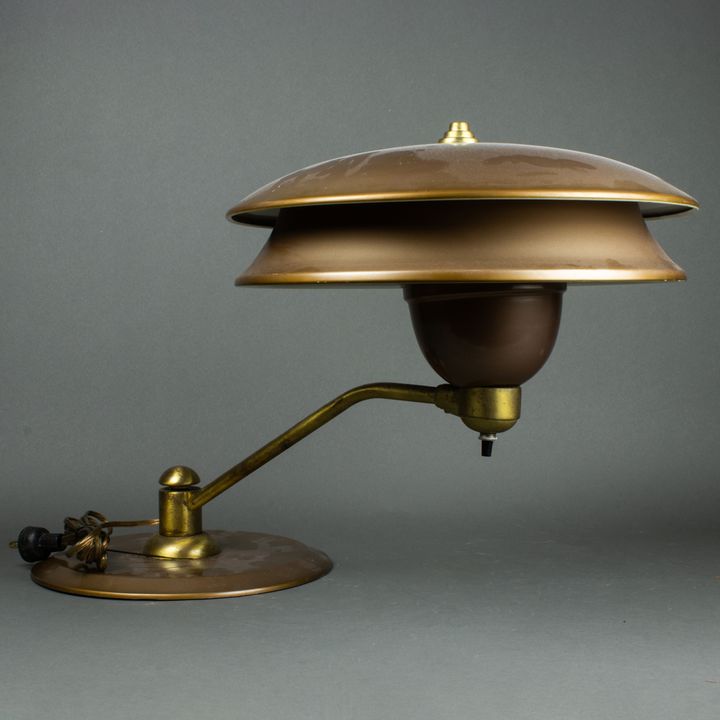 A Modernist enameled metal desk lamp in the manner of Poul Henningsen
