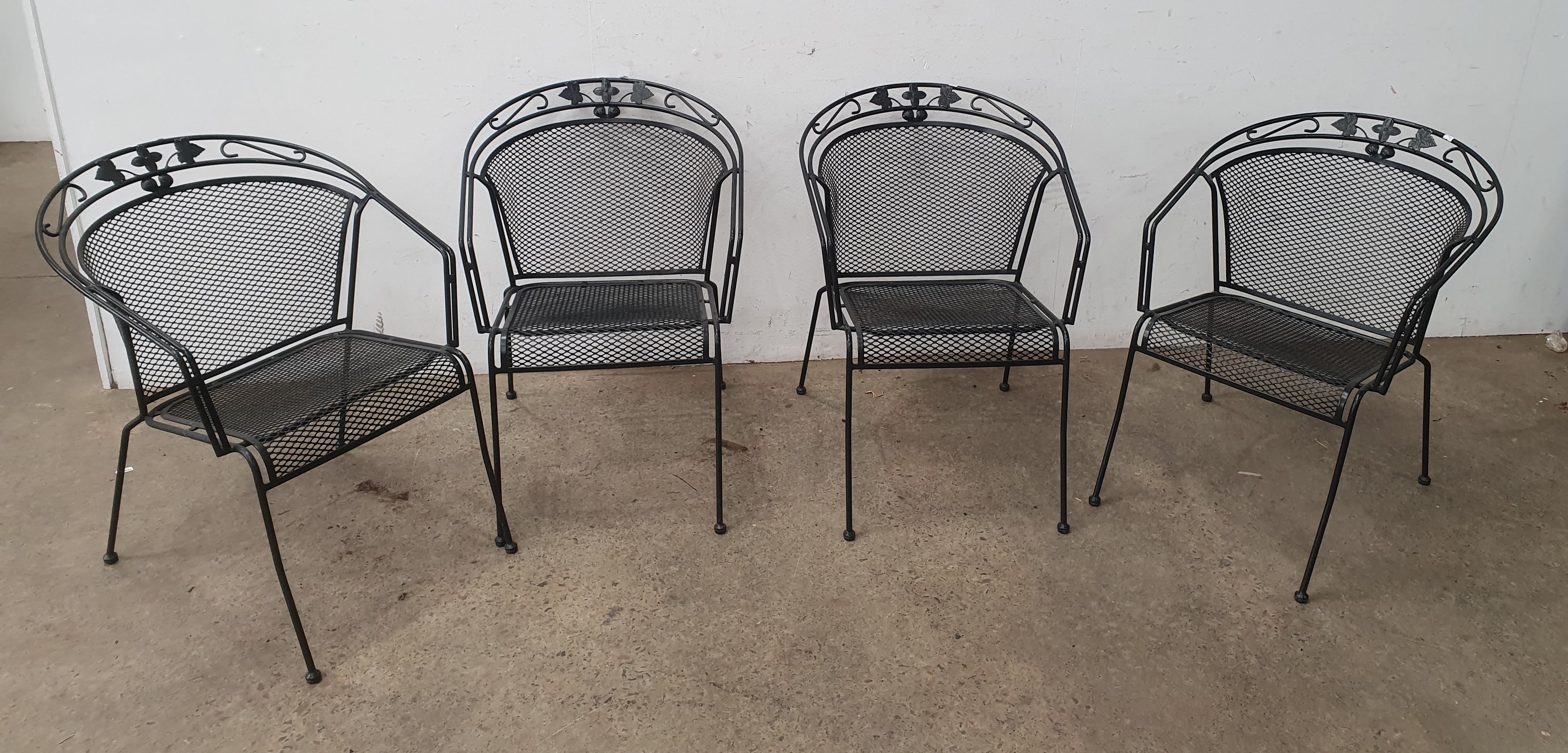 1062 · FOUR BLACK OUTDOOR CHAIRS