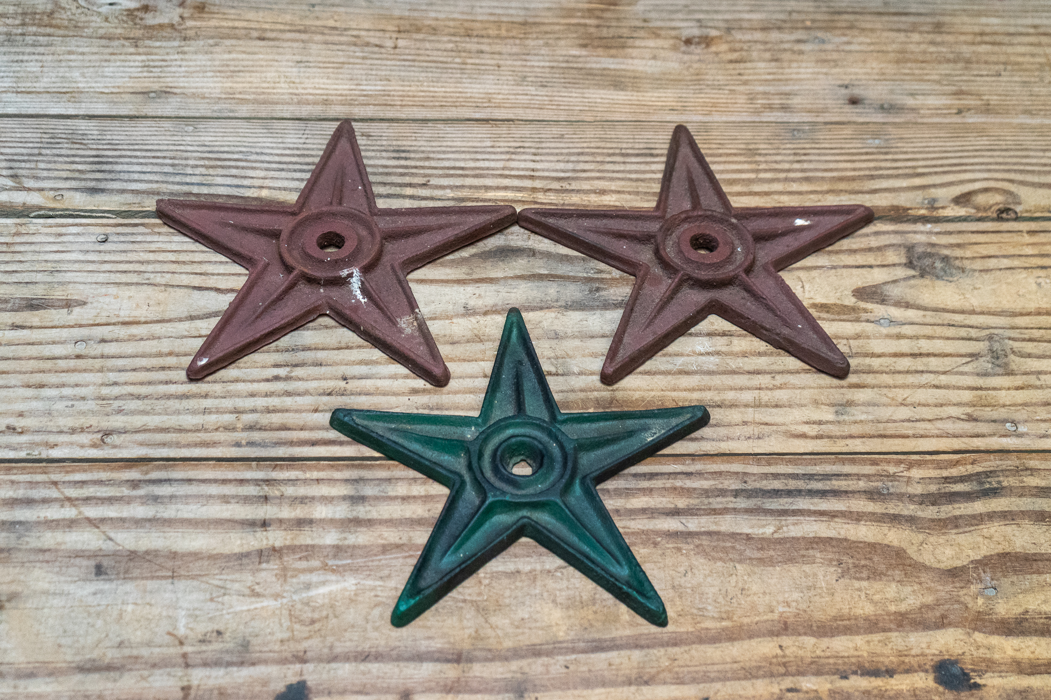 Three Cast Iron Building Stars | Harritt Group, Inc
