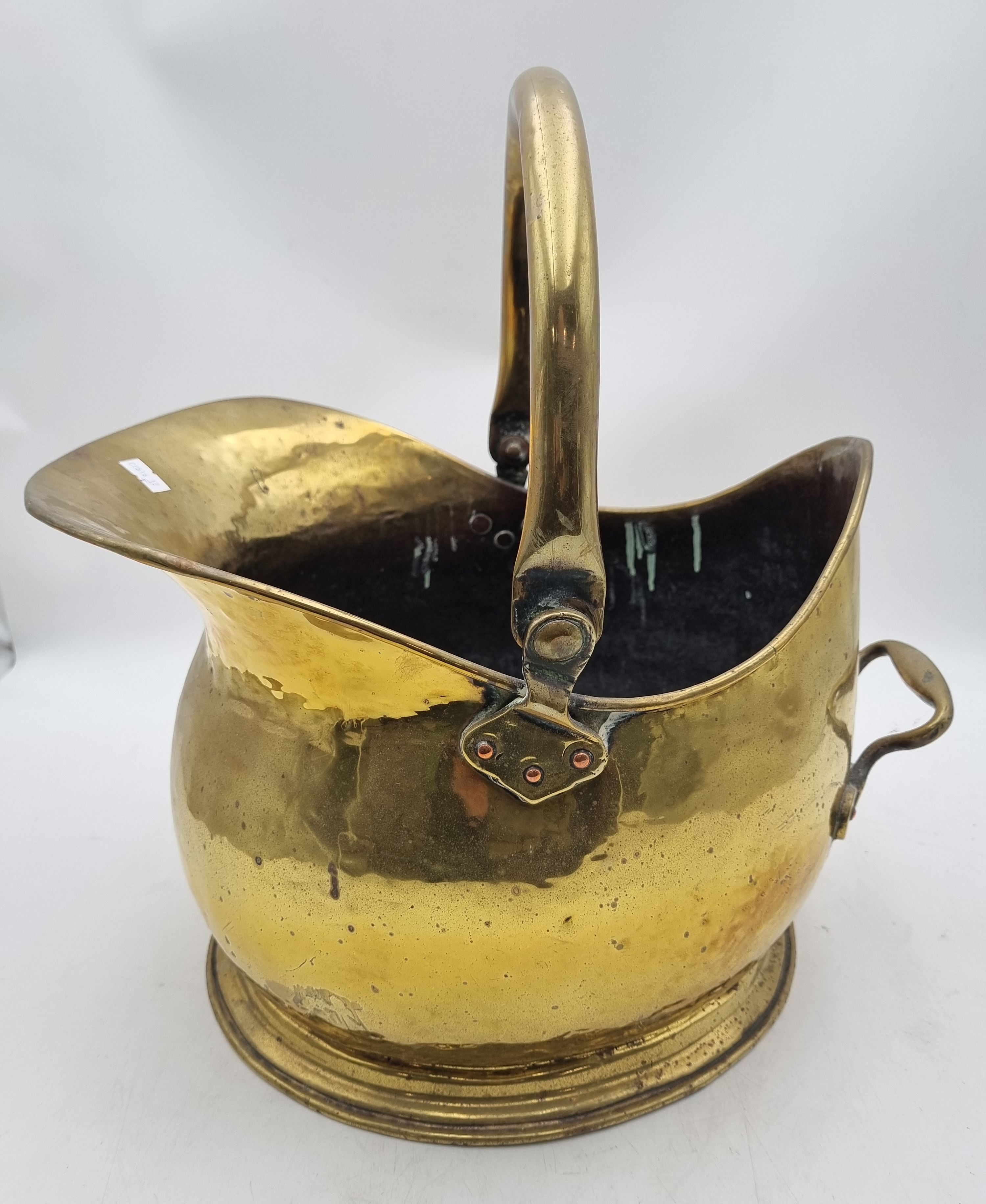 A BRASS COAL SCUTTLE