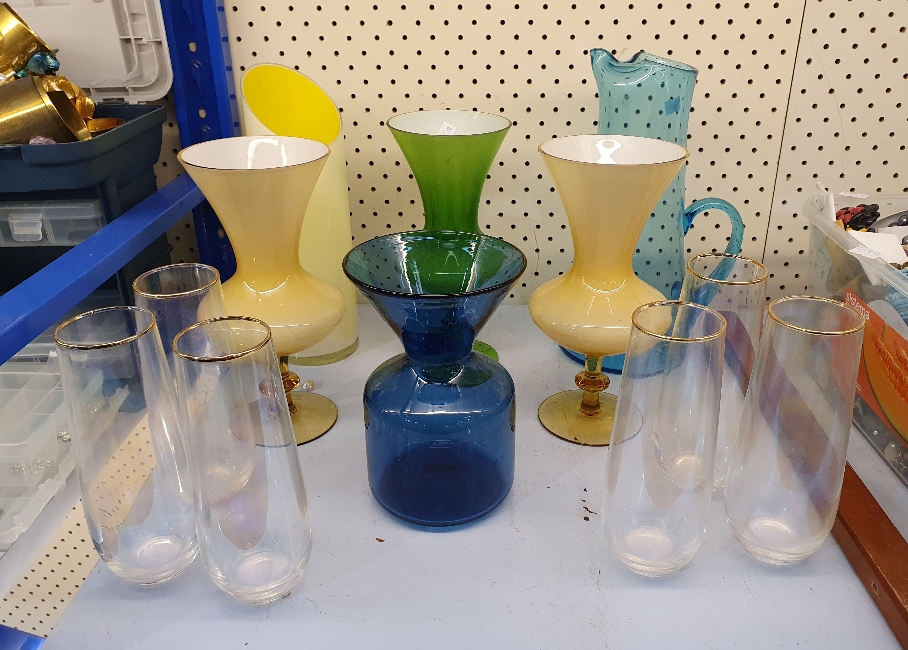 83 · A GROUP OF ART GLASS VASES AND SIX GLASS TUMBLERS