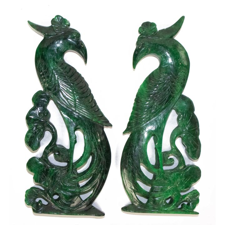 A Chinese dyed jadeite carved 'phoenix'