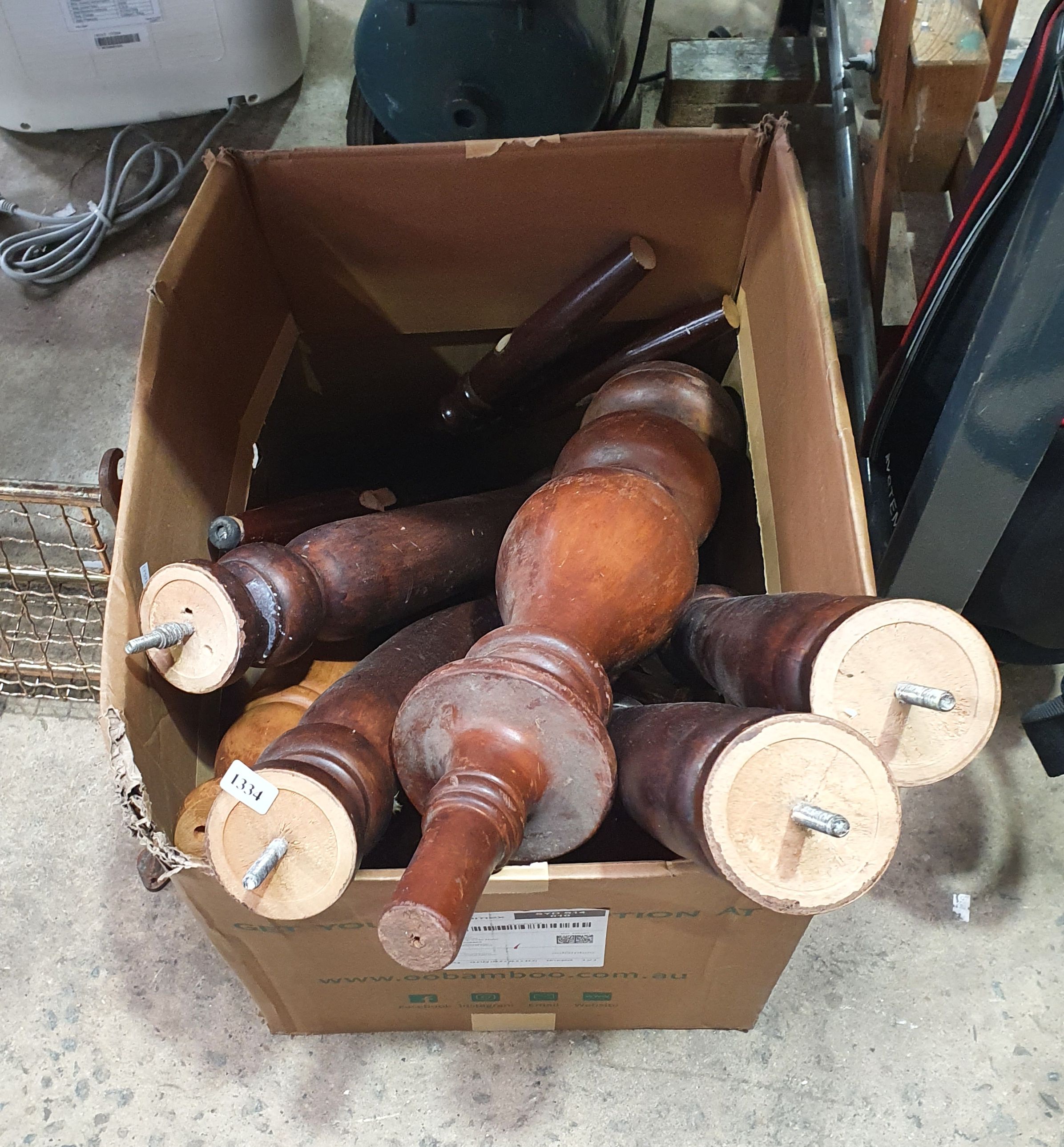 1334 · A BOX OF VARIOUS TURNED TIMBER LEGS
