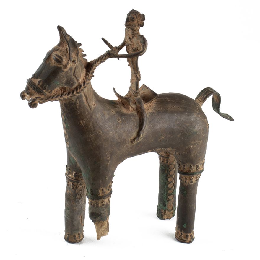 An Indian or Benin metal horse and rider